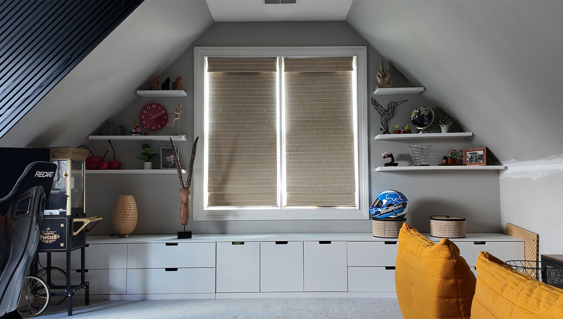  Room darkening cellular shades on attic window showing visible light glow through fabric and bright edge gaps during daytime