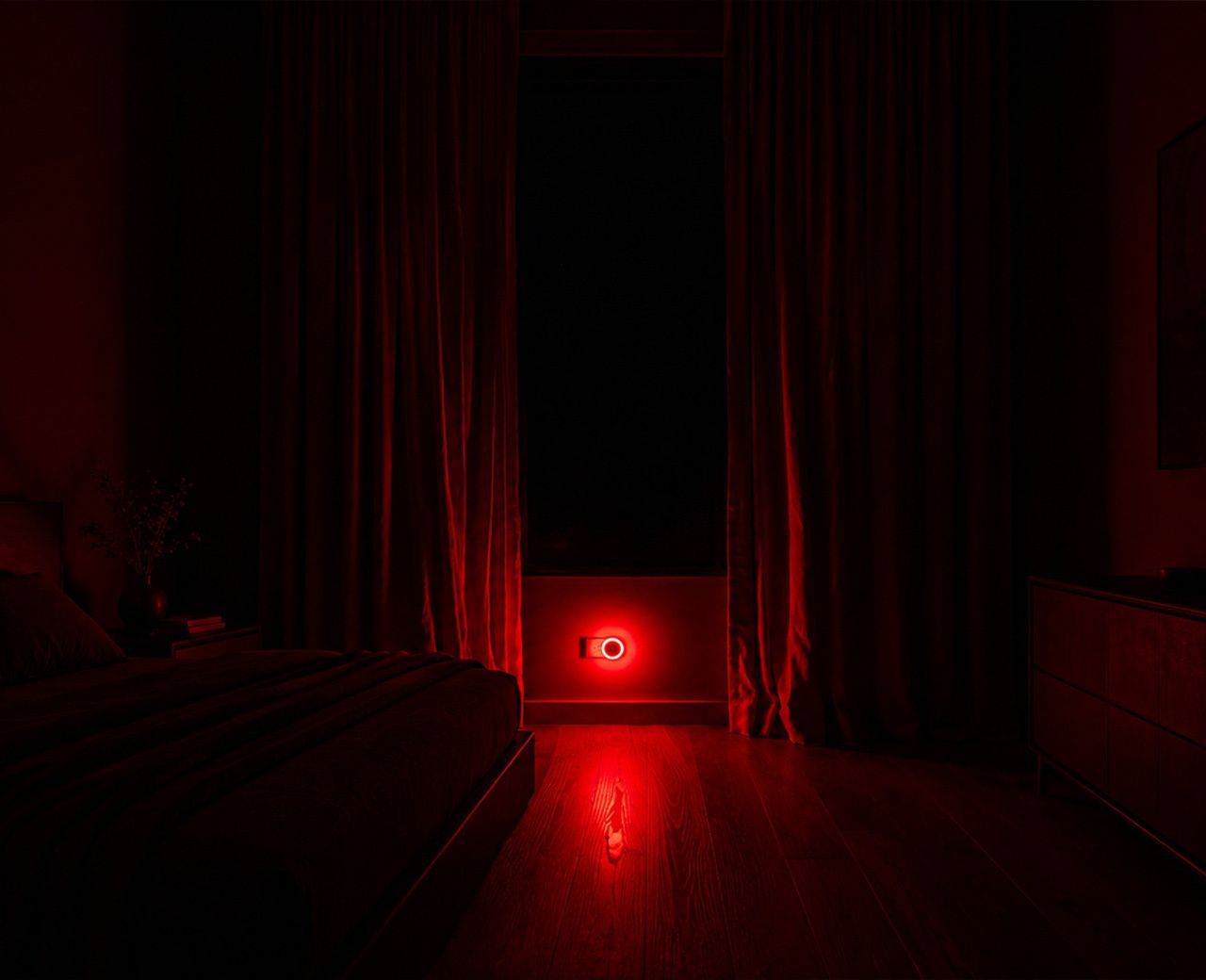 UBlockout motion sensor night light emitting circadian-safe red light in bedroom with blackout shades