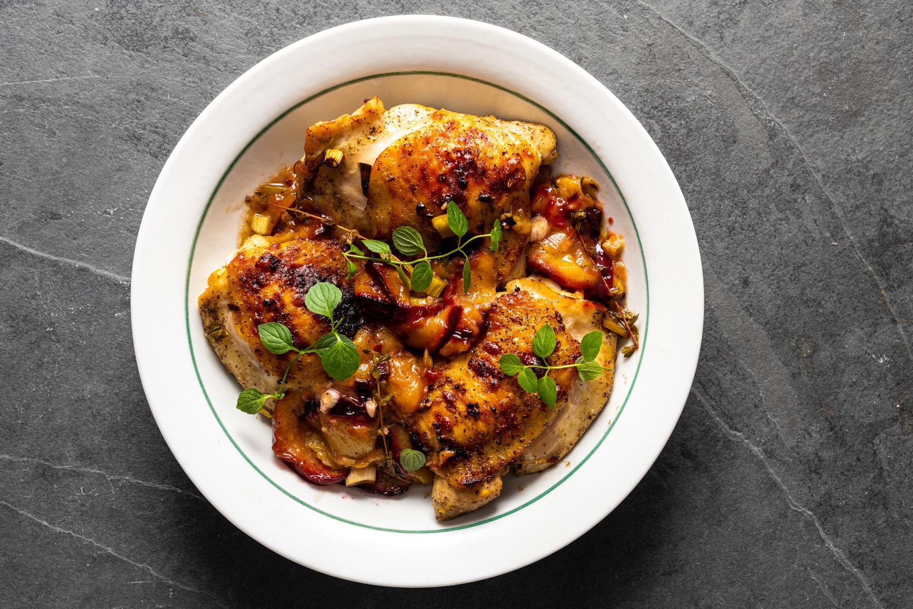A plate of red wine braised chicken.