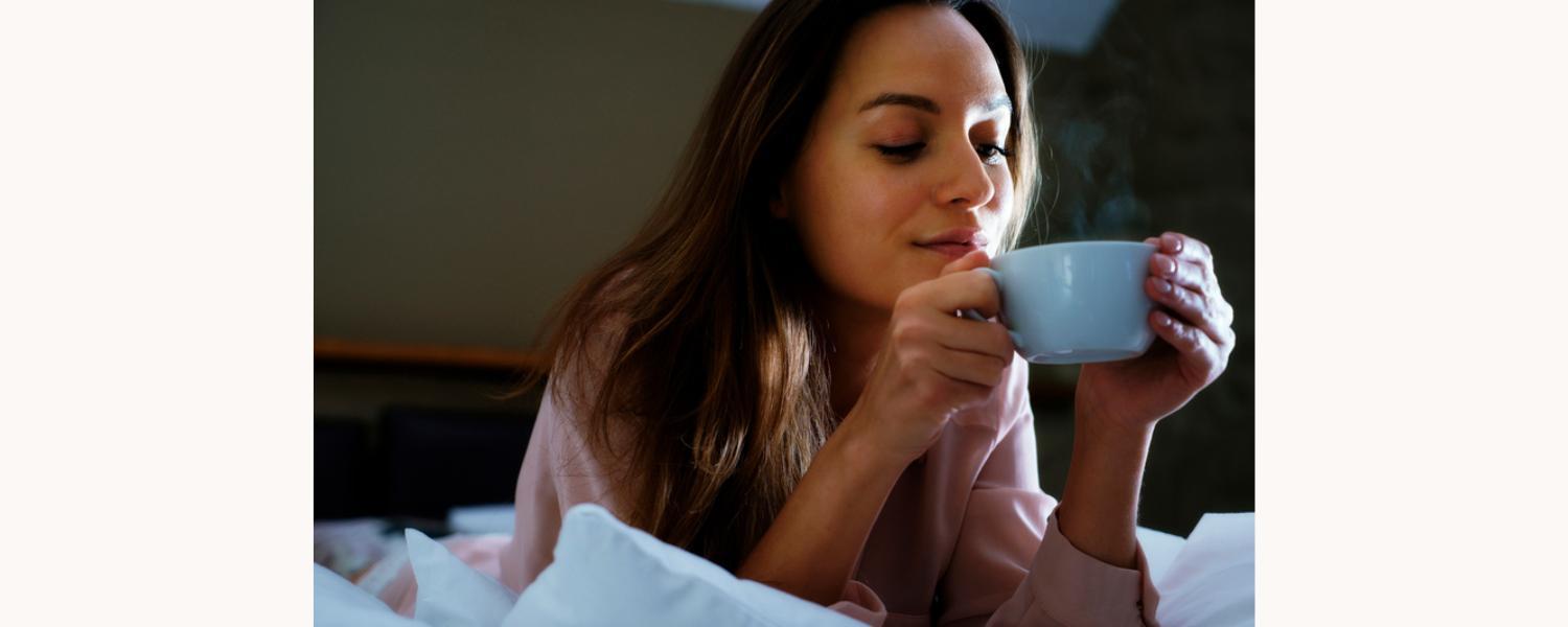 woman drinking a cup of tea