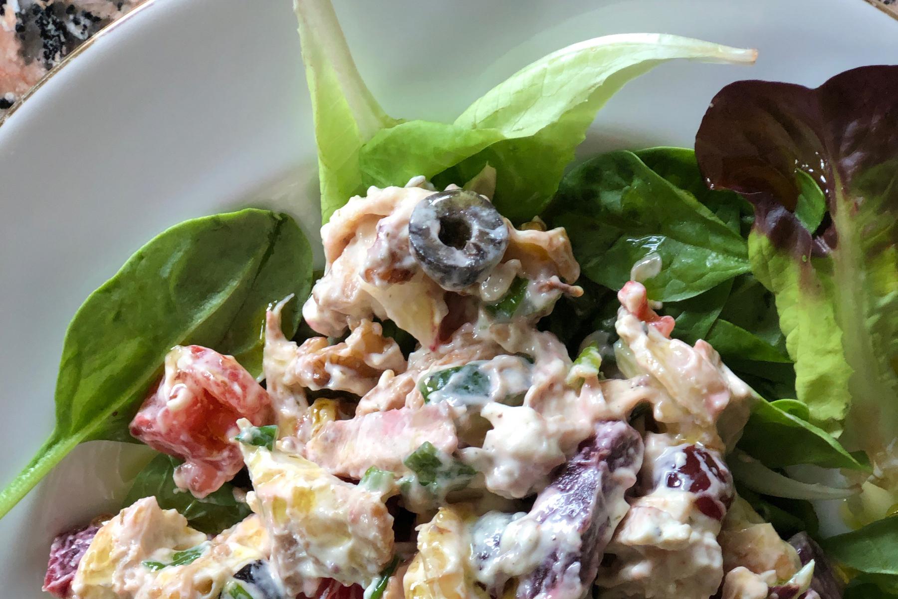 A close-up of paprika lemon chicken salad.