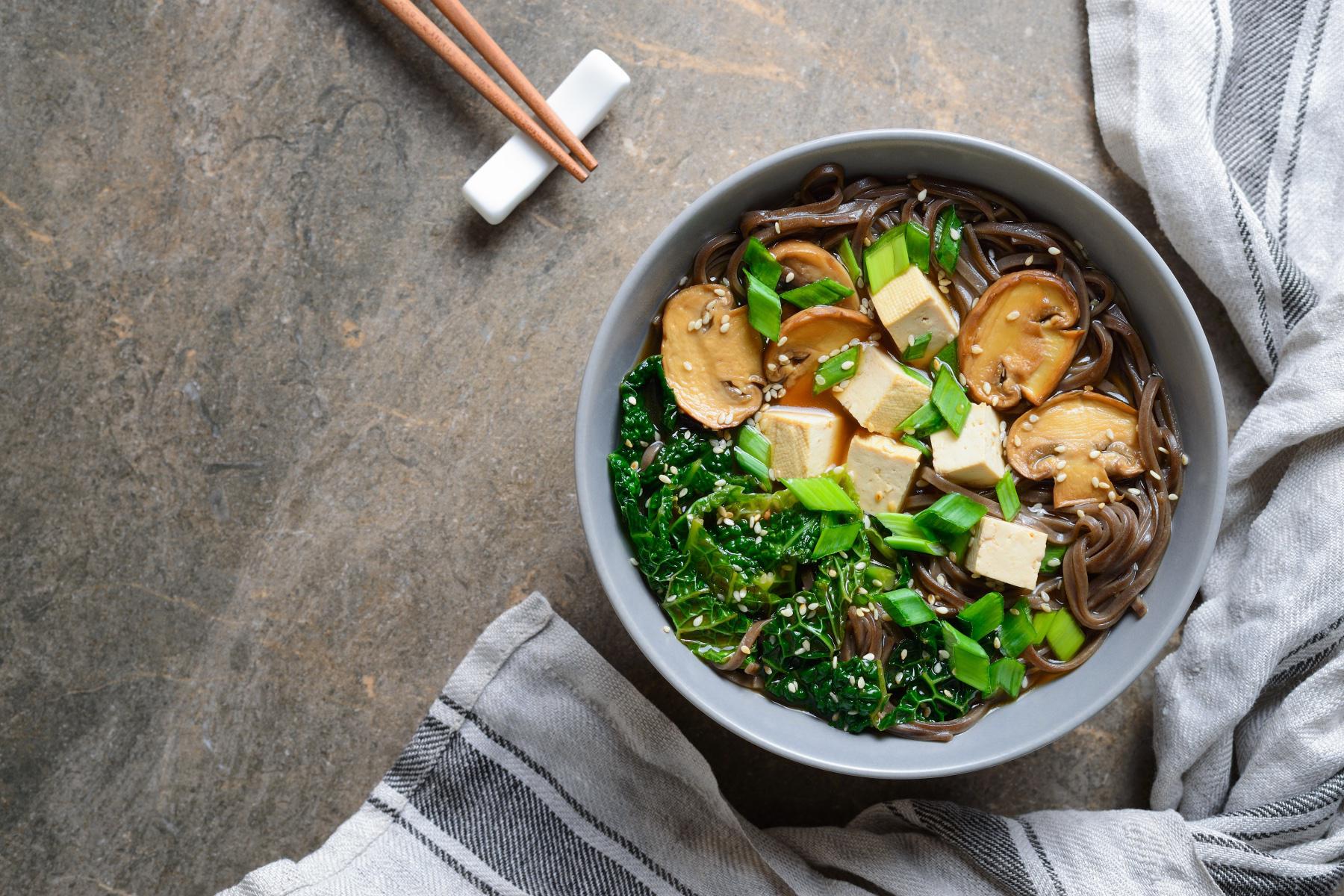Overhead view of tofu noodle bowl.