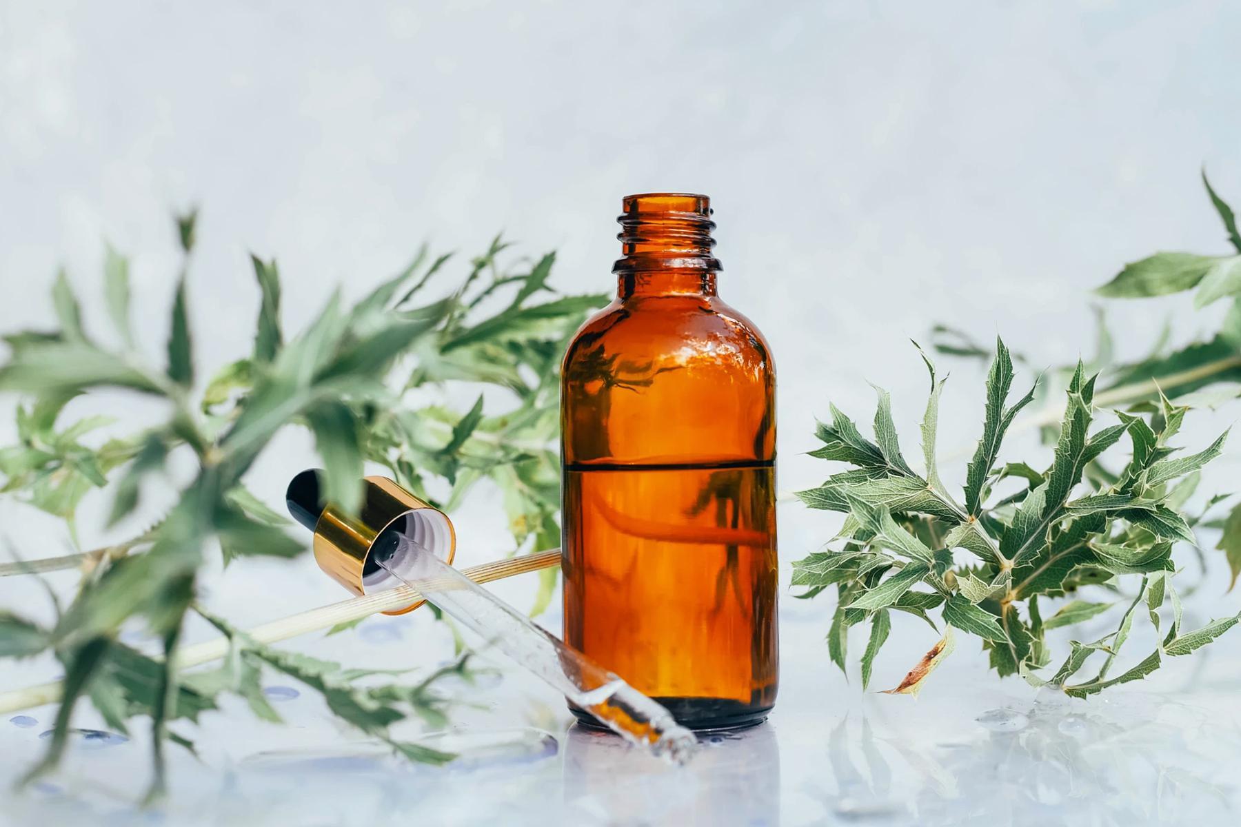 Close-up of aromatherapy oil jar.