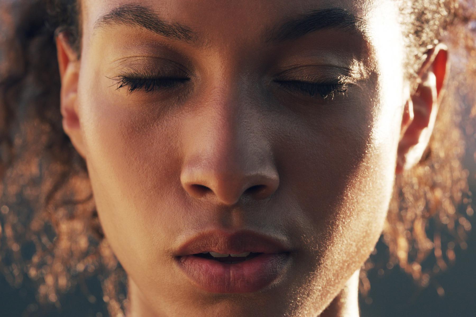 A close up of a young woman's face
