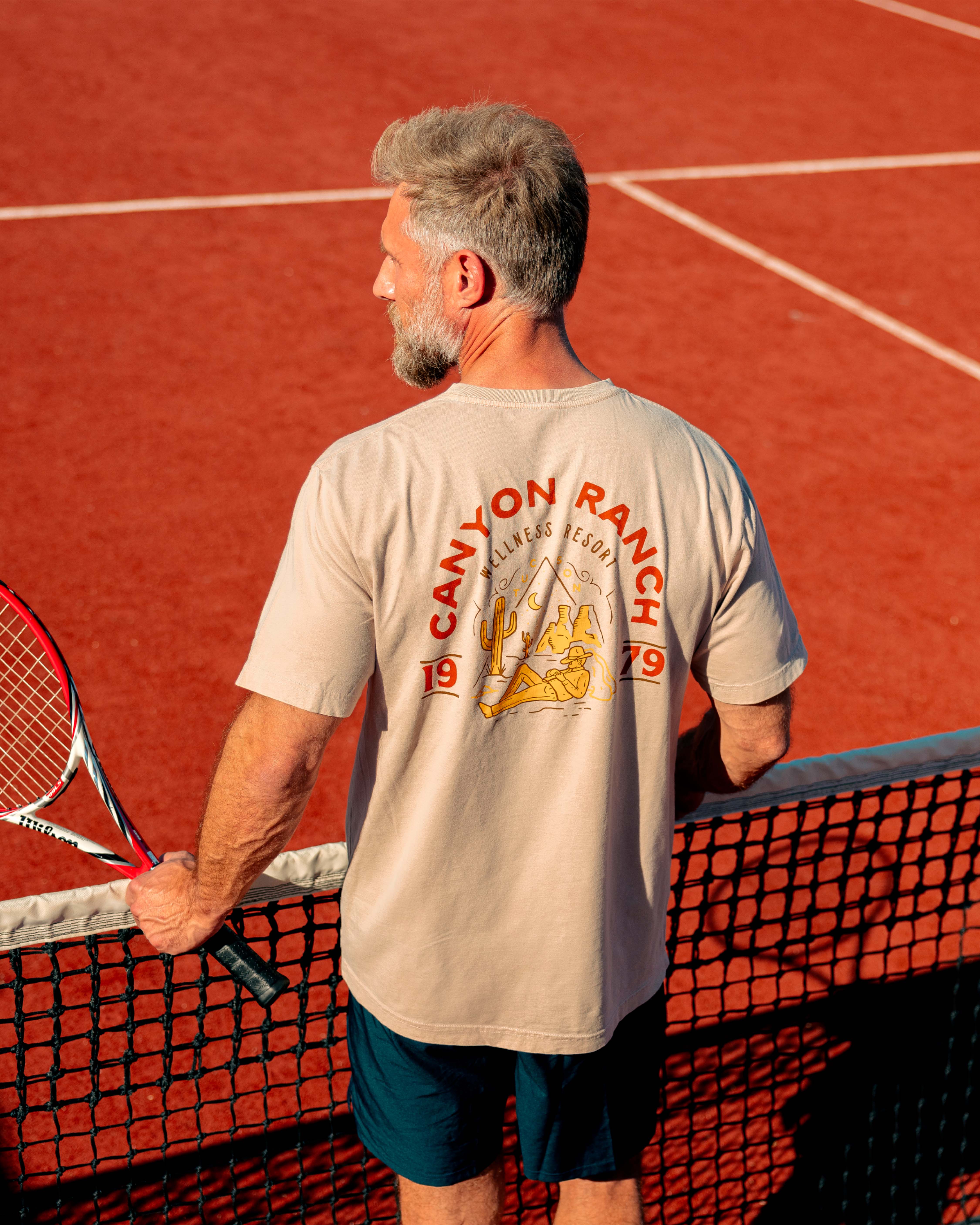 a man playing tennis