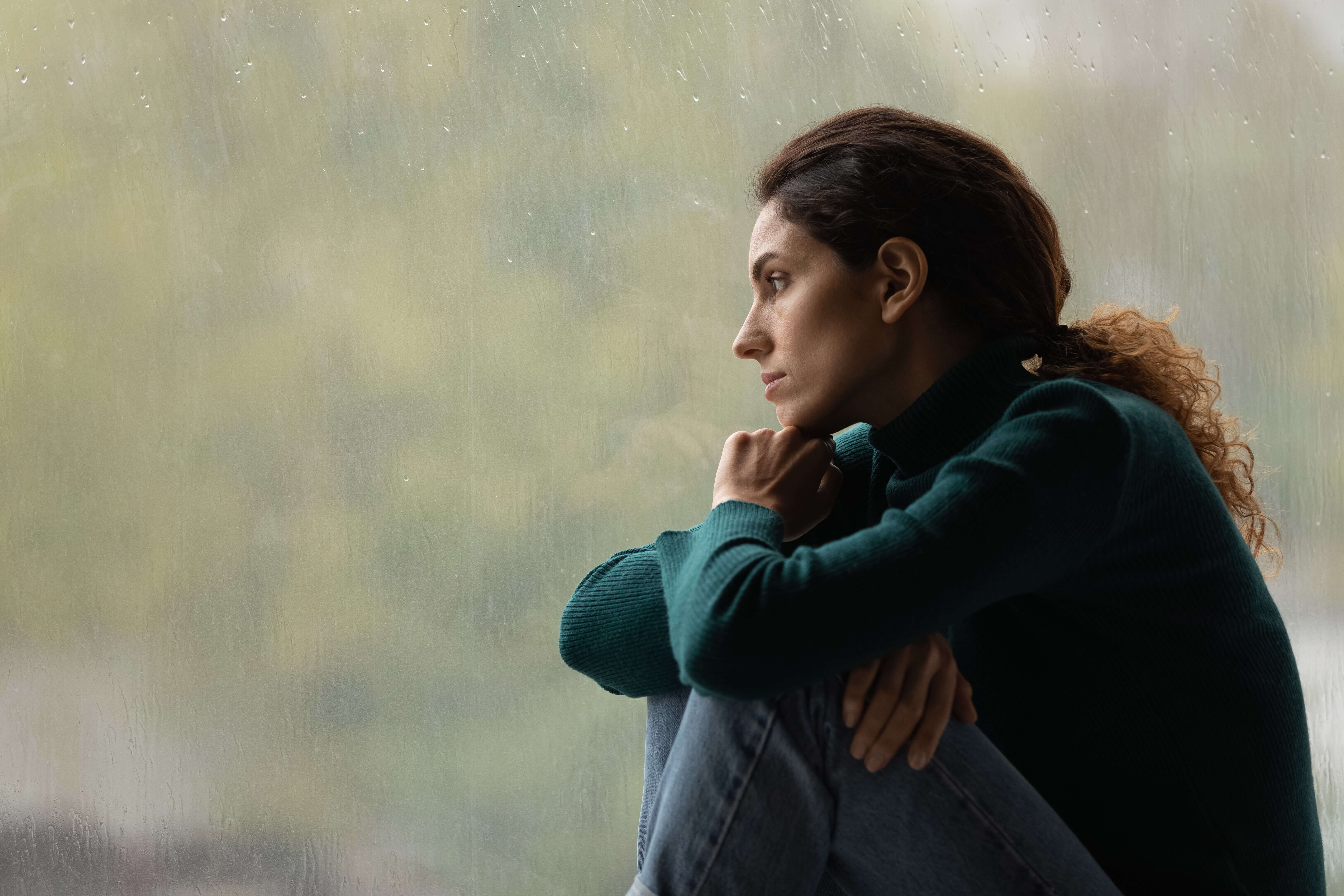 a woman sitting alone