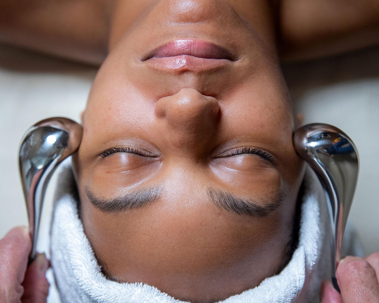 Close up of woman's face while getting a Biologique Recherche treatment.