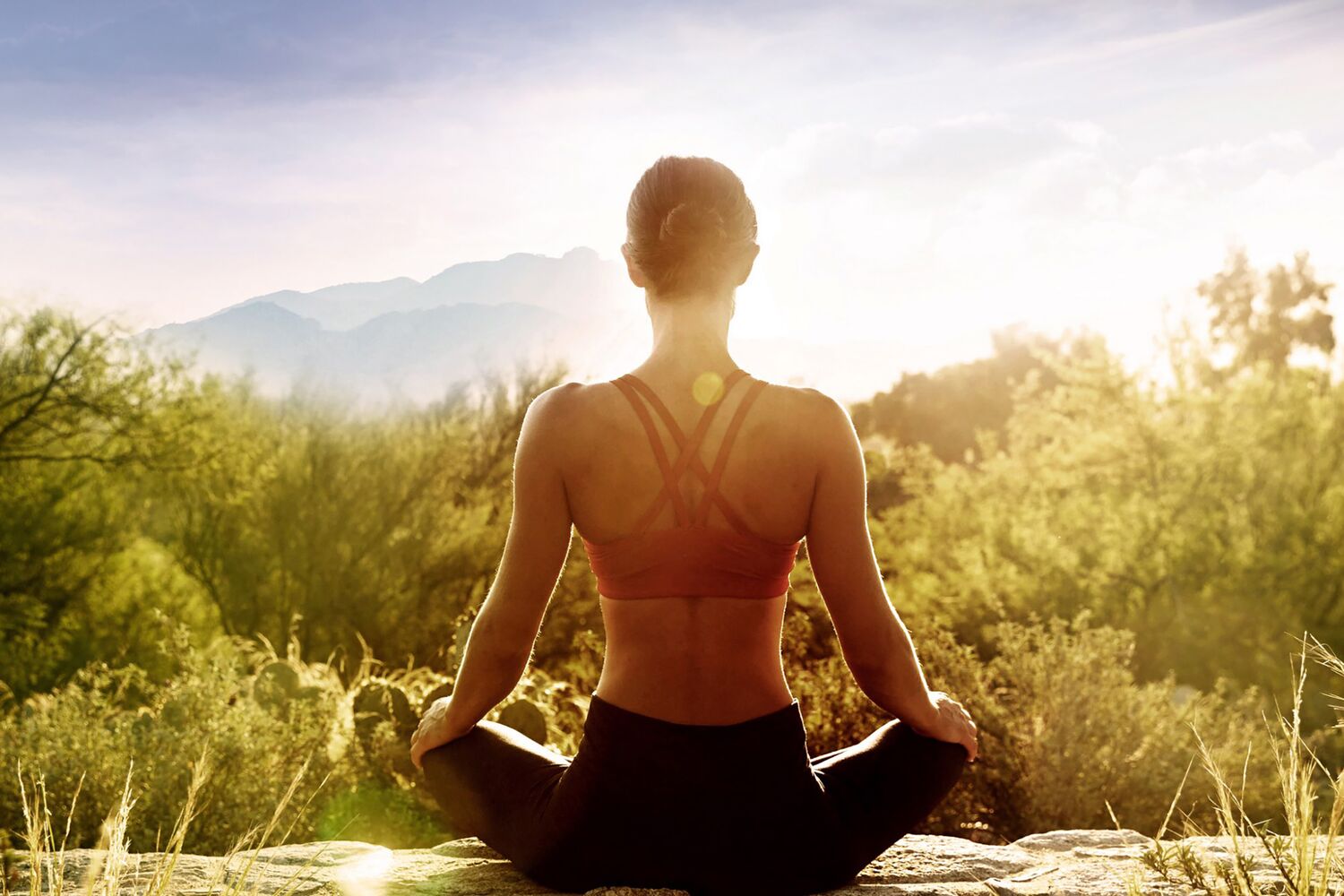 A woman getting an outdoor meditating