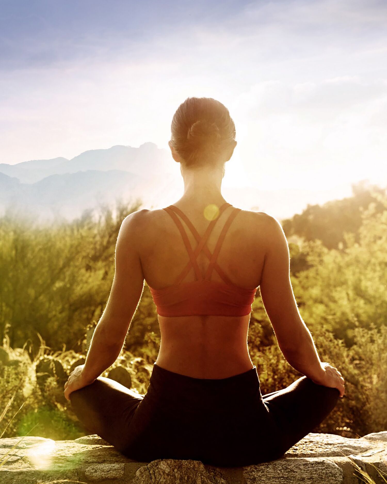 A woman getting an outdoor meditating