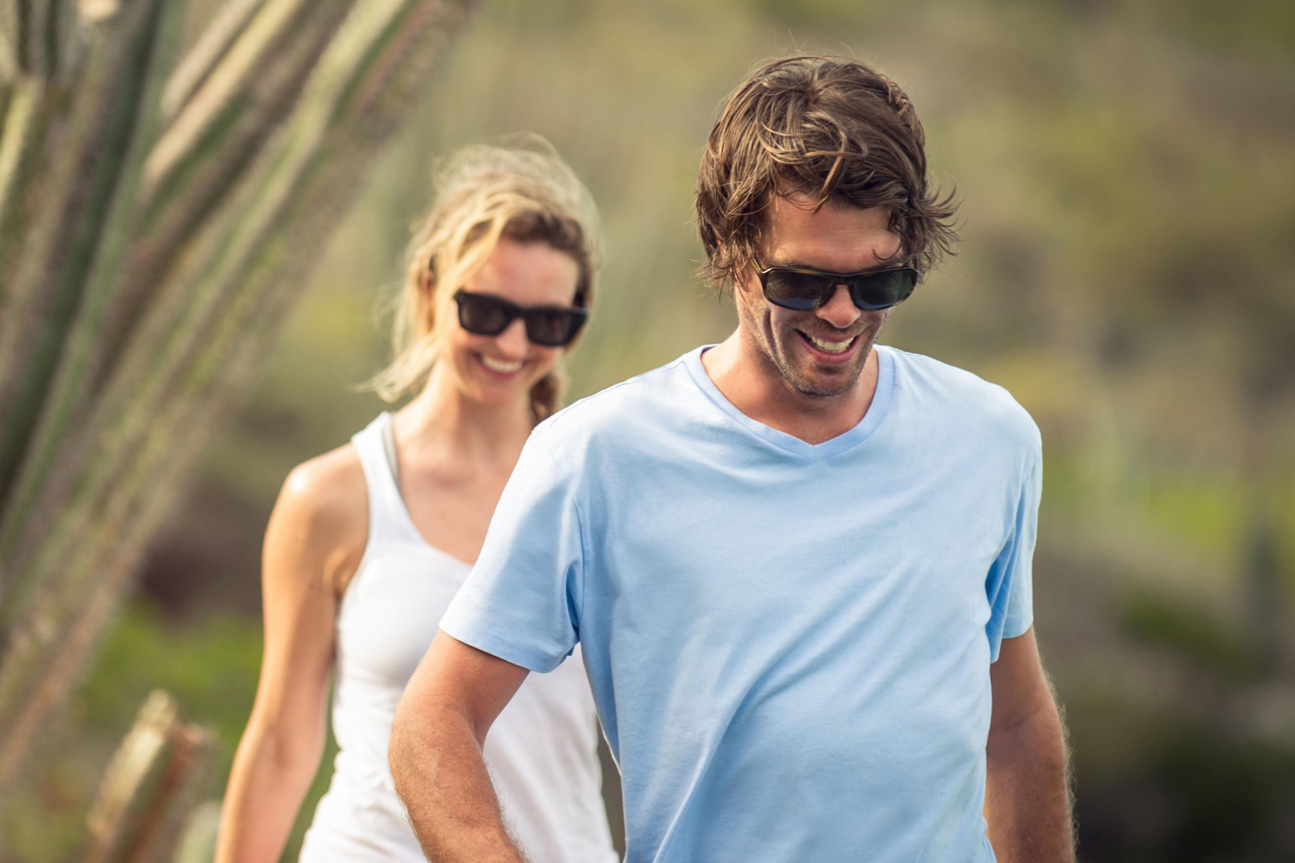 A couple hiking in the desert
