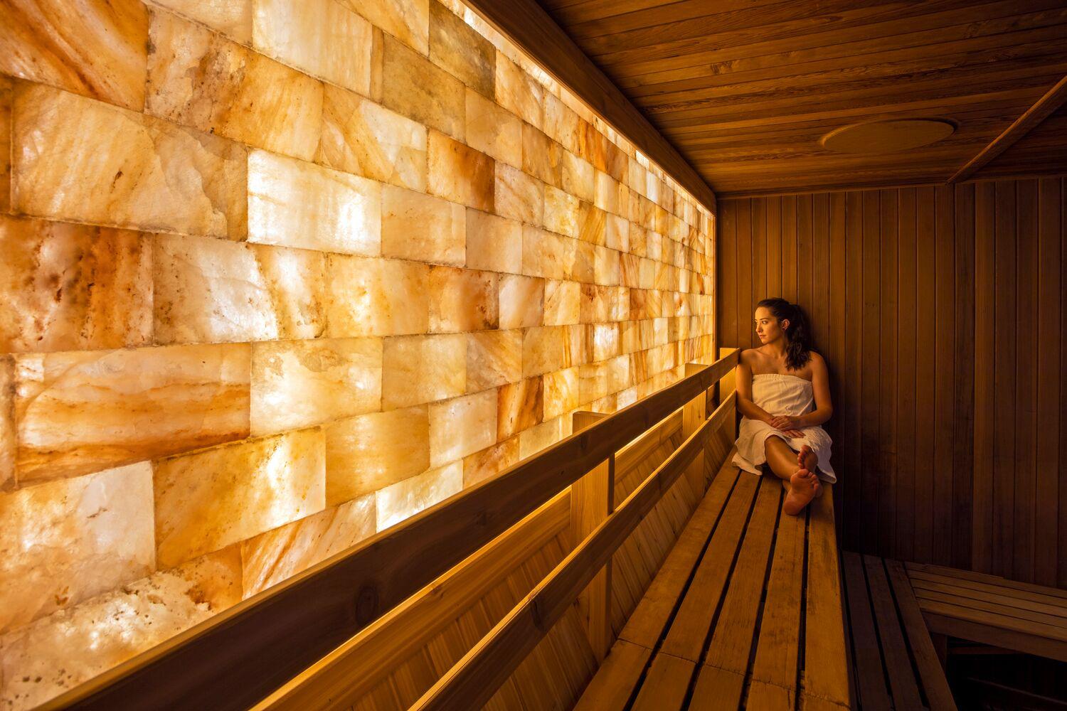 Woman sitting in sauna at Tucson resort