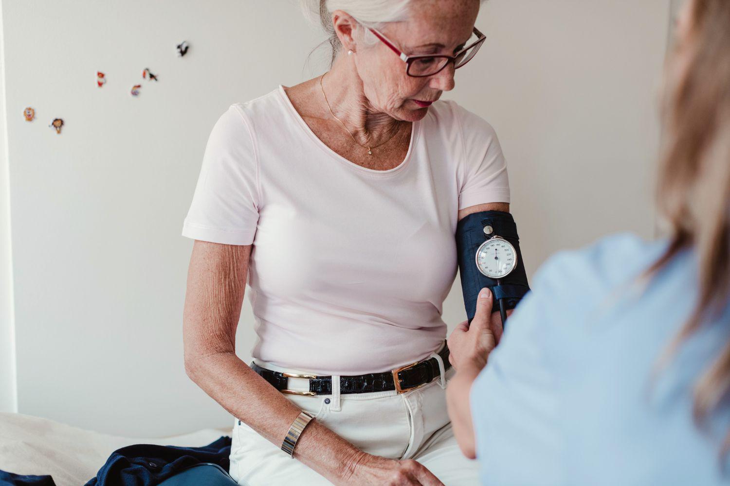 Woman receiving cardio and blood pressure testing