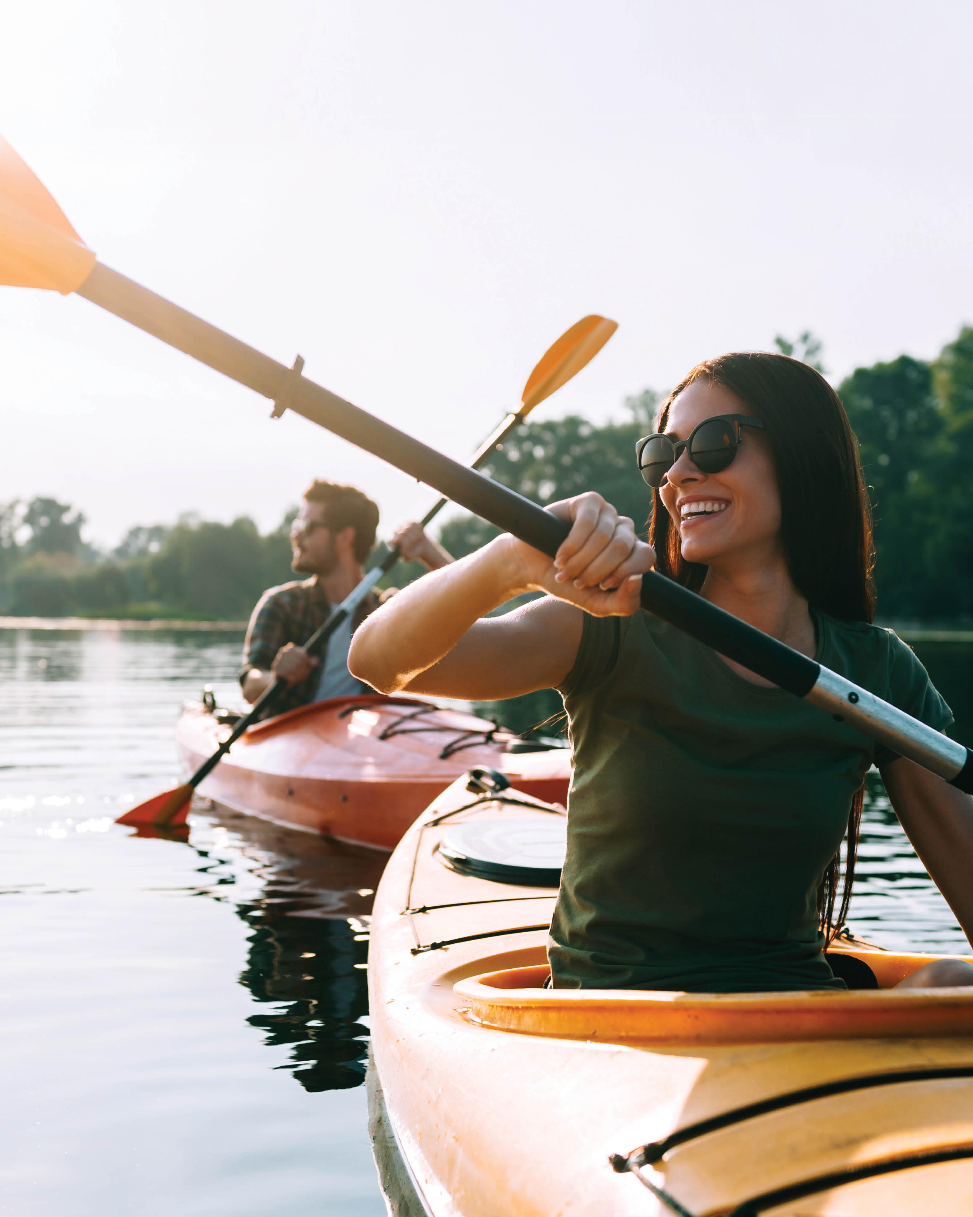 Man and woman kayaking.
