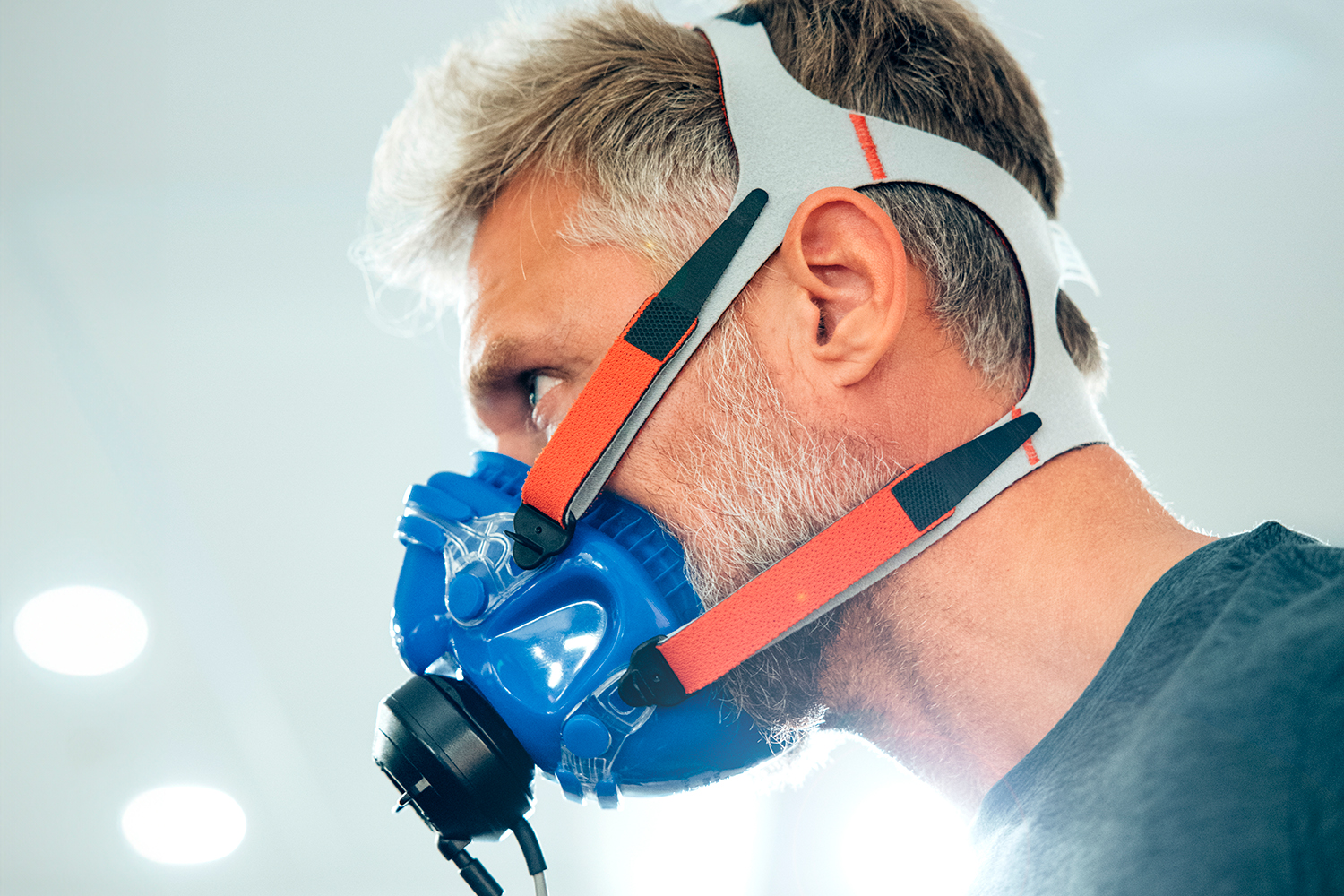 a man in a VO2 Max Mask