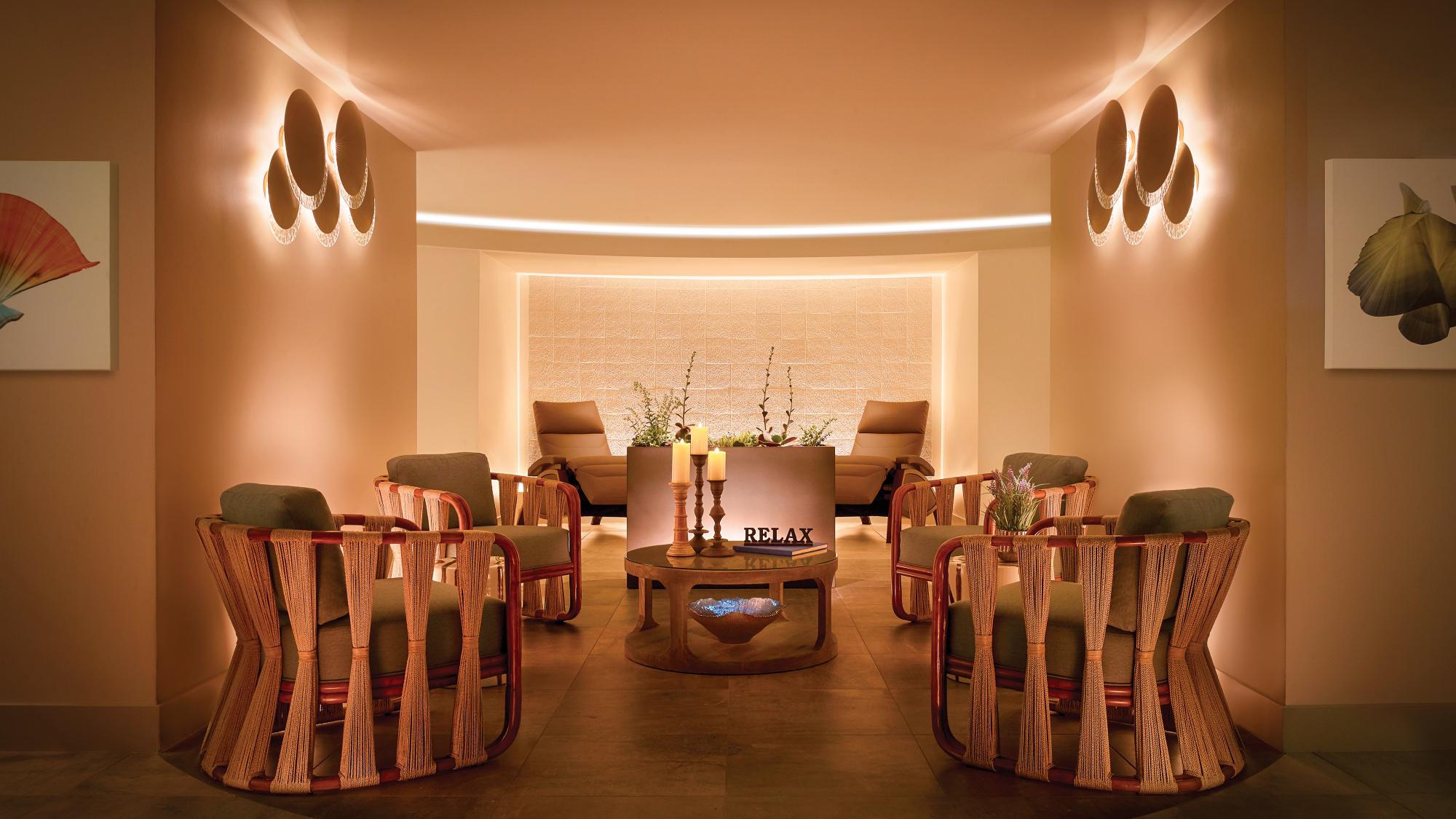 A moody room with relaxing chairs