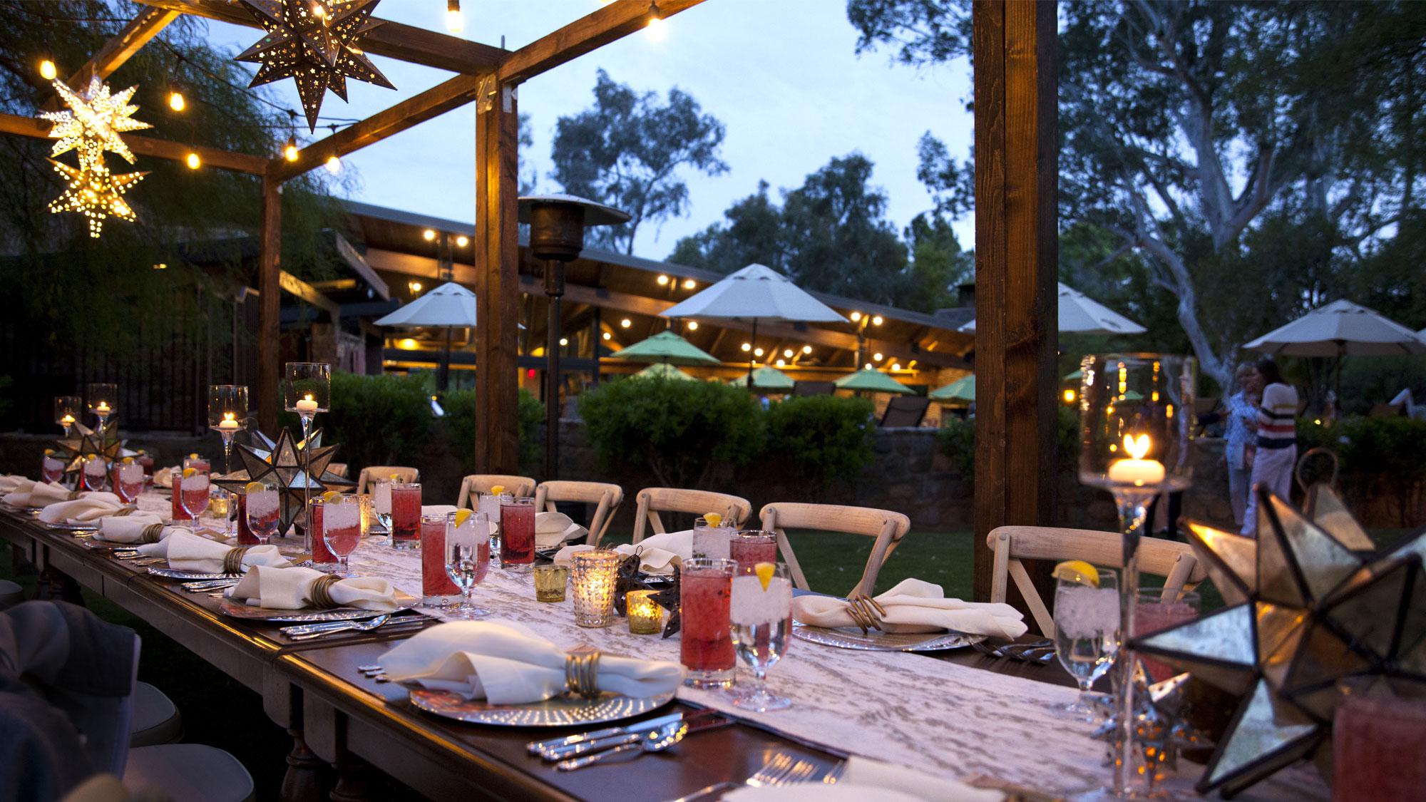 Beautiful outdoor group dining at dusk.