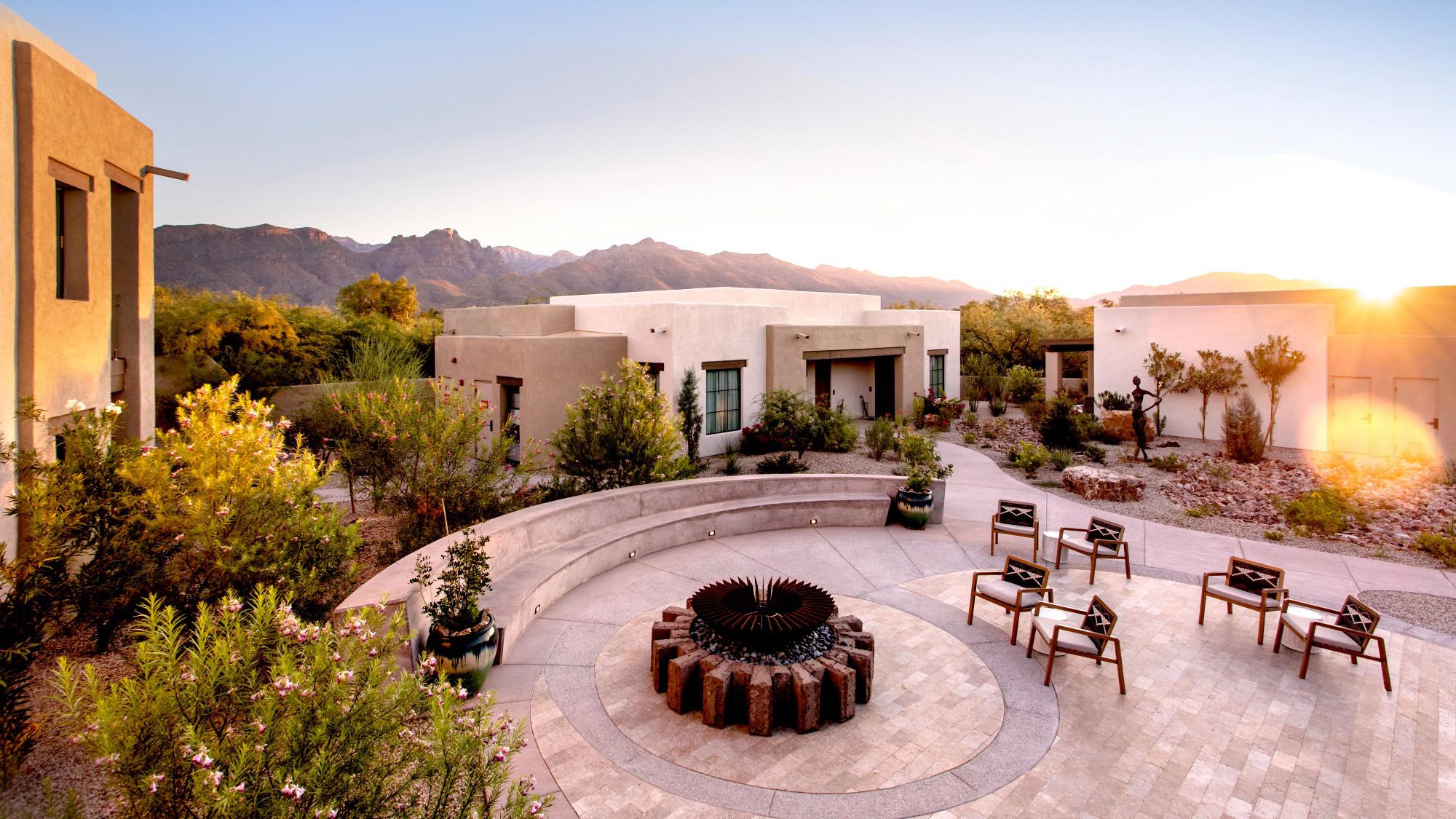The Reserve Patio with fire pit and mountains in the background