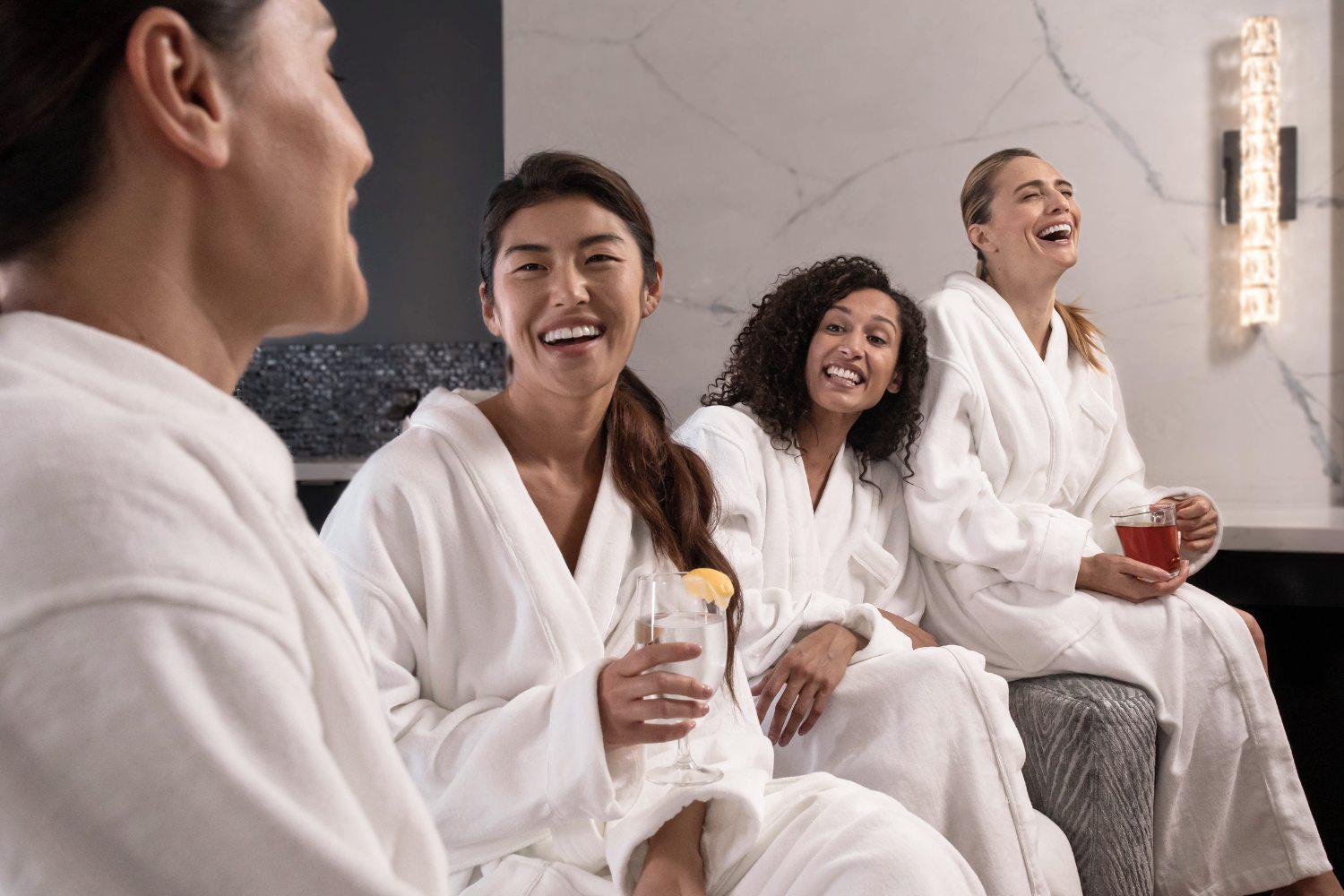 Woman in the Spa at Canyon Ranch Tucson in their robes drinking tea during a corporate retreat