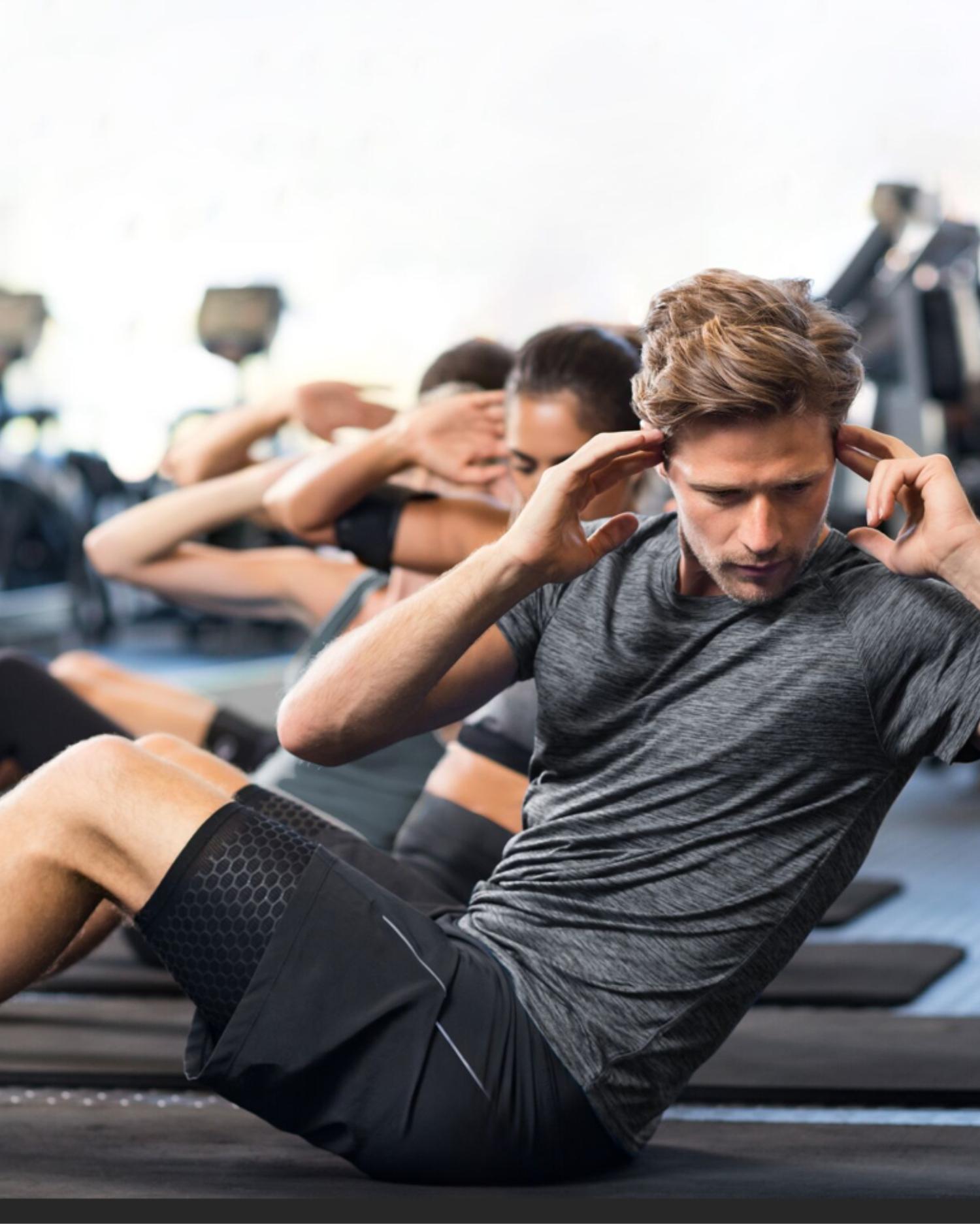 A group of young executives exercising in the Fitness Center at Canyon Ranch Lenox Health Spa Resort