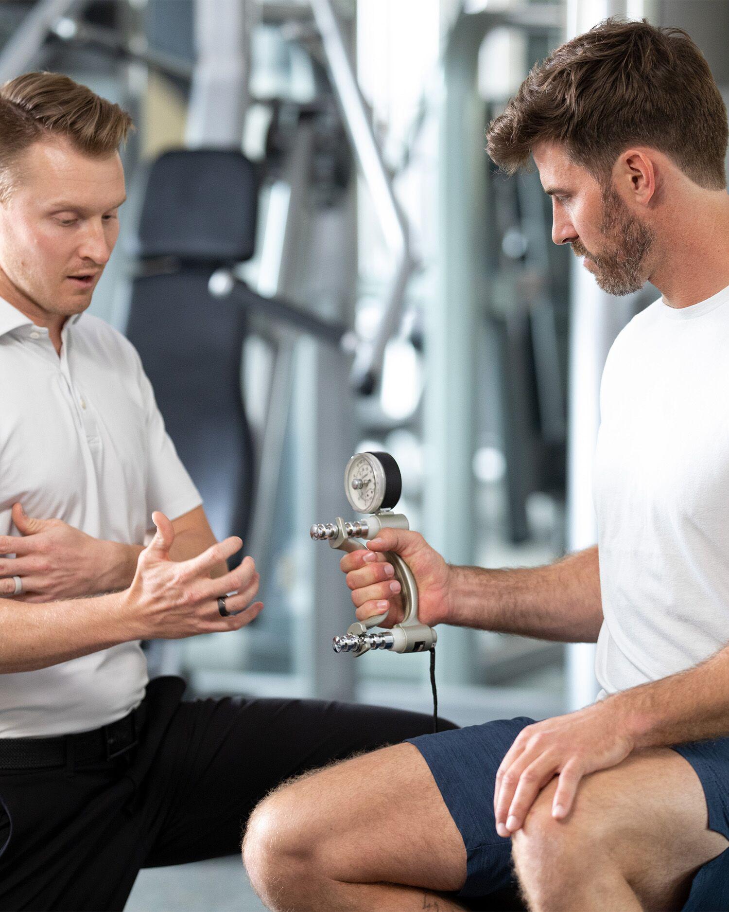 An executive physical with a force grip assessment performance science assessment. 