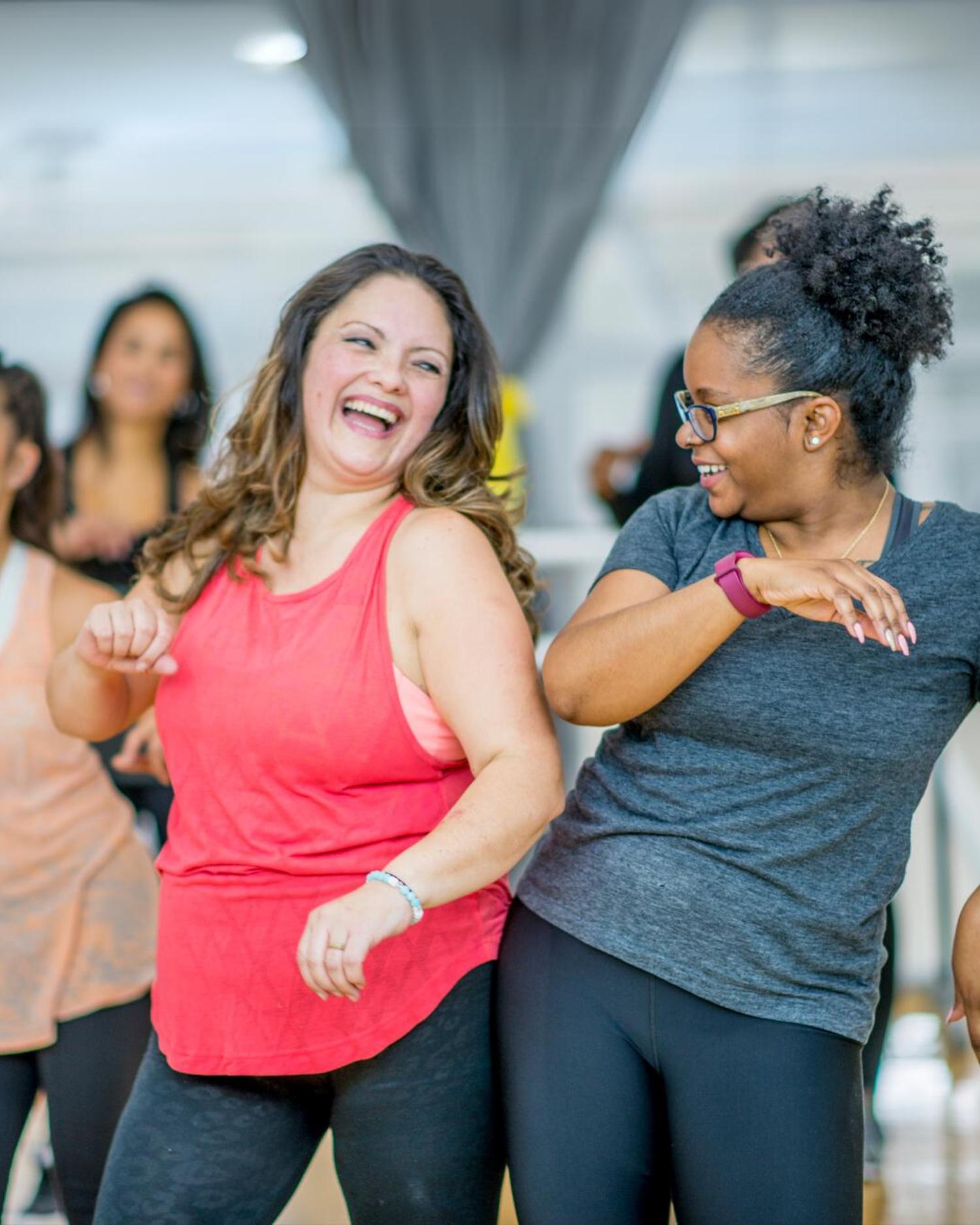 A group of woman of all ages dancing at the Fitness Center at Canyon Ranch Lenox Health Spa Resort
