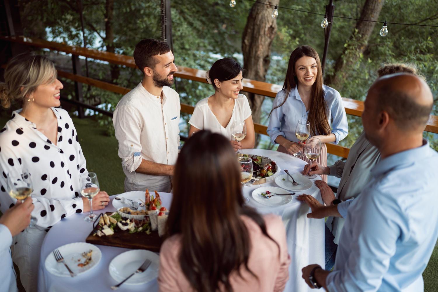 A group of young professionals on an outdoor deck