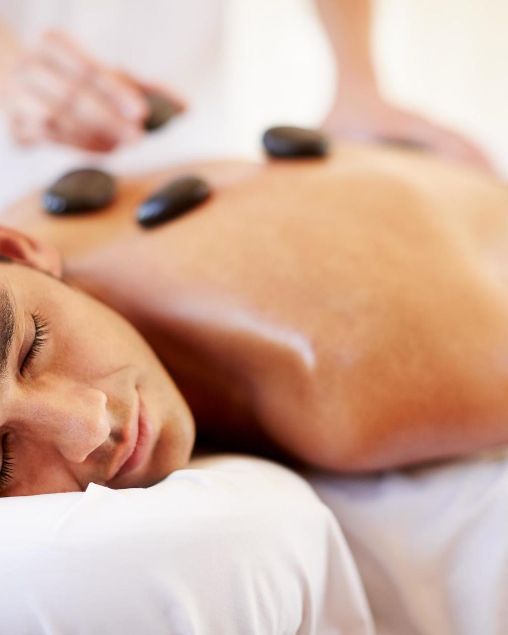a man getting the Canyon Ranch Stone Massage