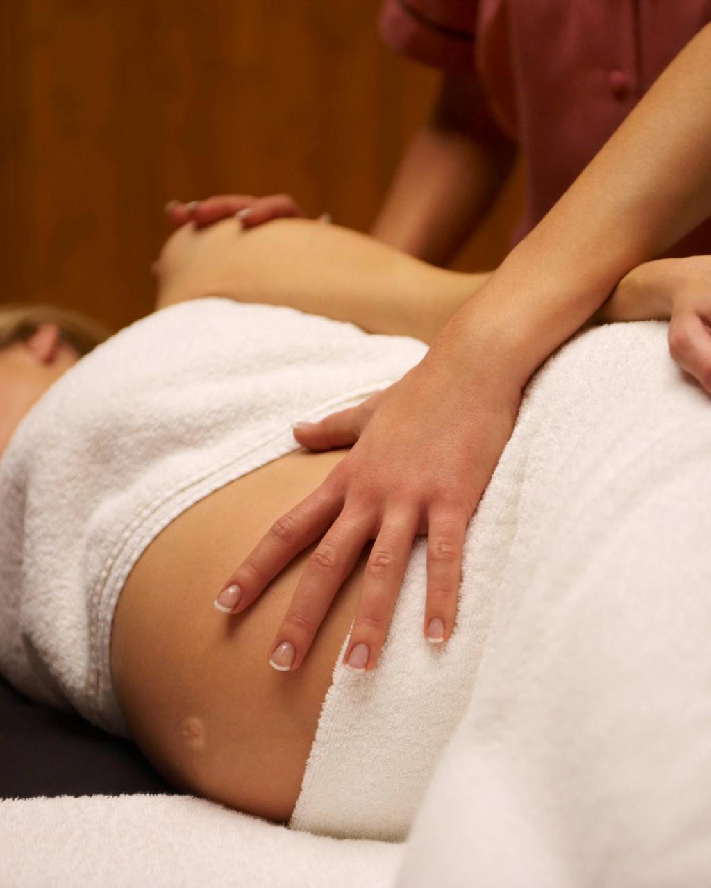 a woman getting the Prenatal Massage at canyon ranch fort worth wellness club + spa