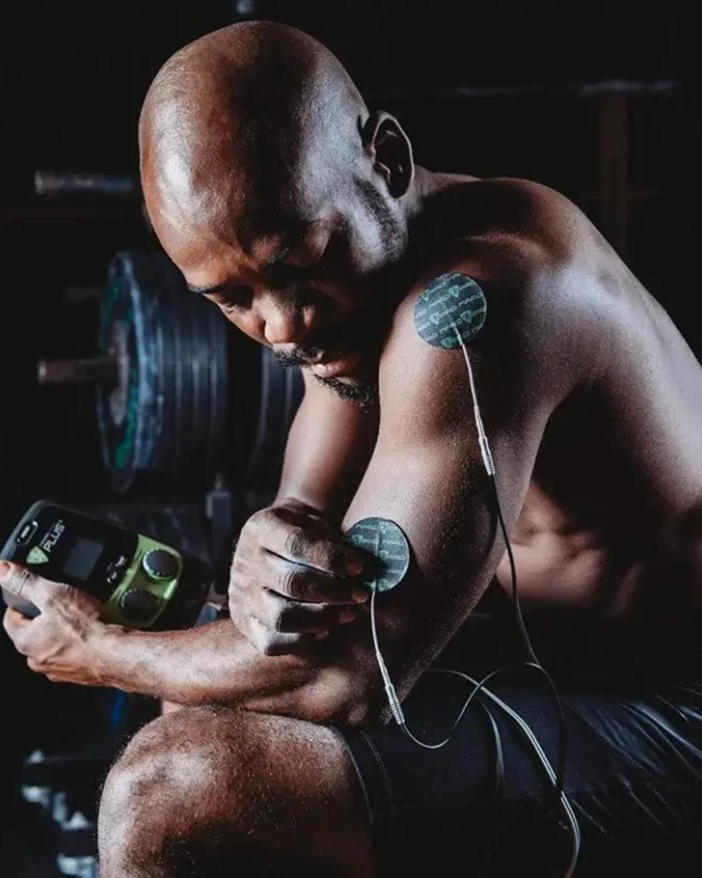 A man using Marc Pro NMES at Canyon Ranch Fort Worth Wellness Center