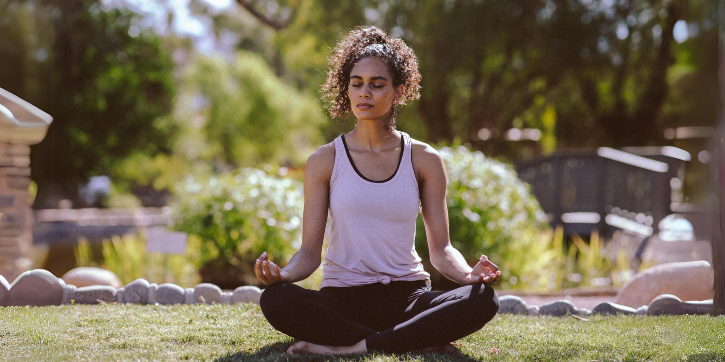 Woman doing yoga at Canyon Ranch Tucson Health Spa Resort