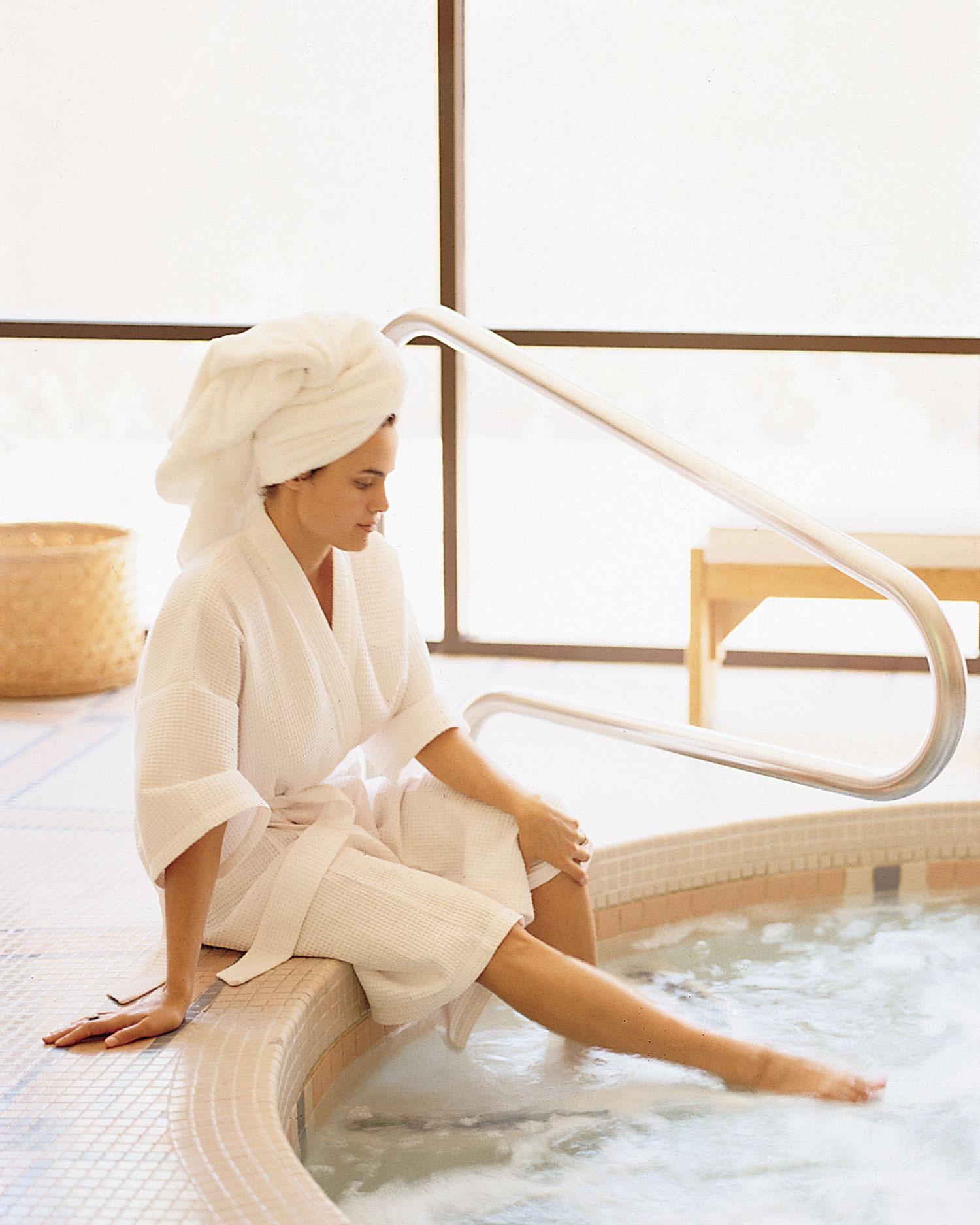 Woman lounging by whirpool