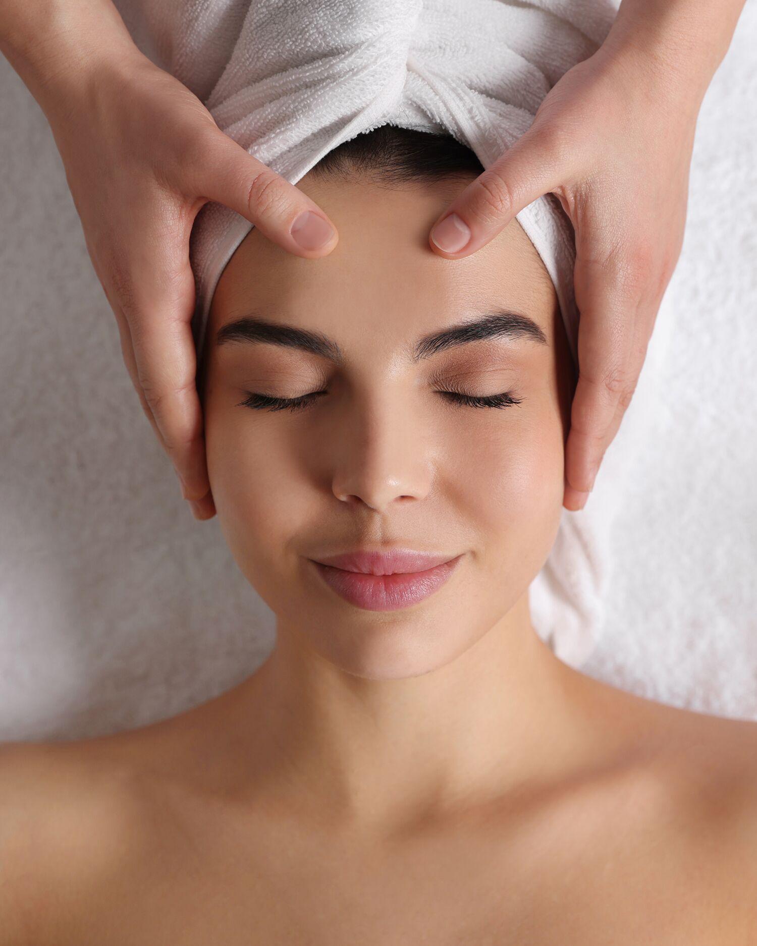 a woman getting a facial