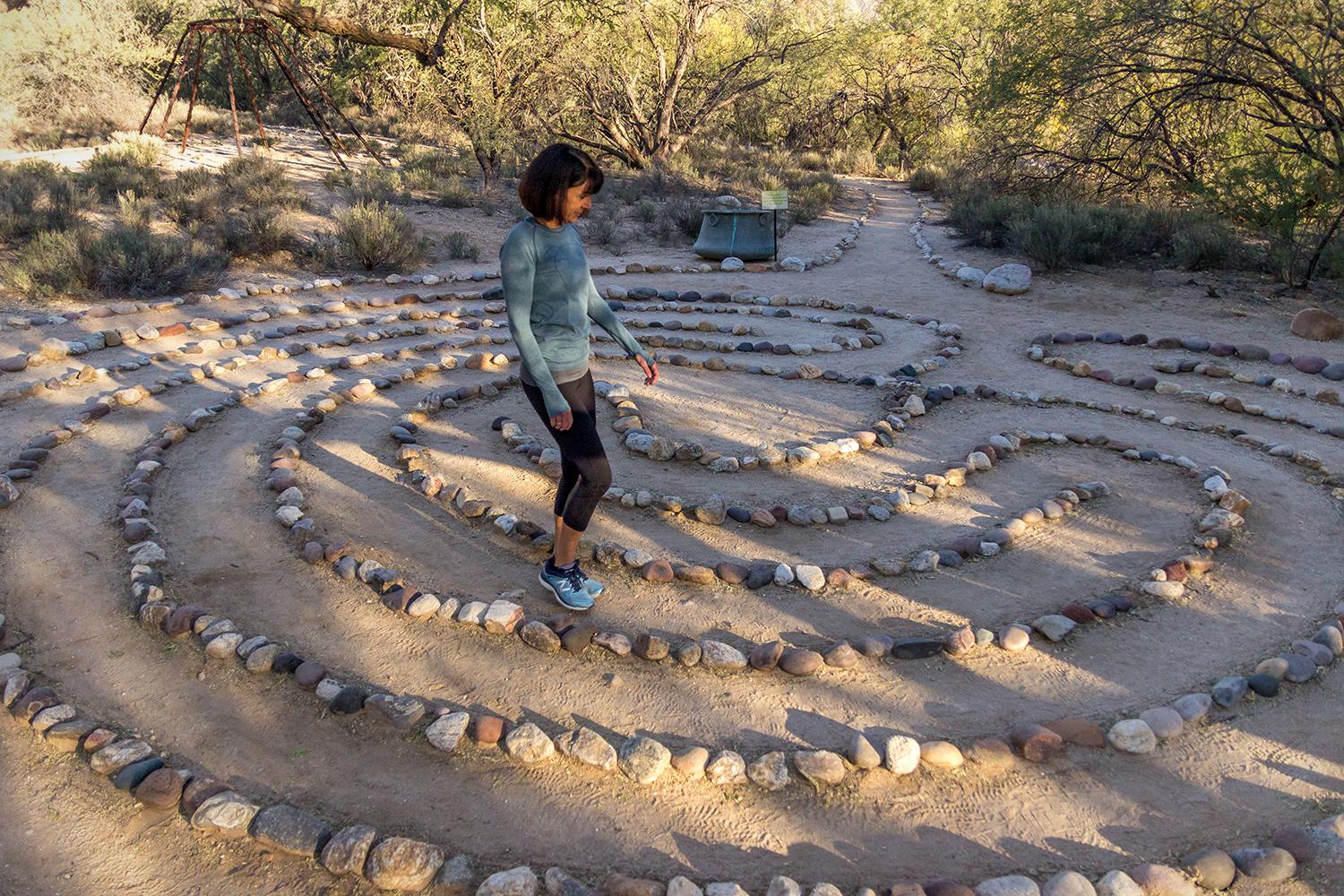 Woman walking the labyrinth at a spiritual retreat at Canyon Ranch Tucson Health + Spa Resort