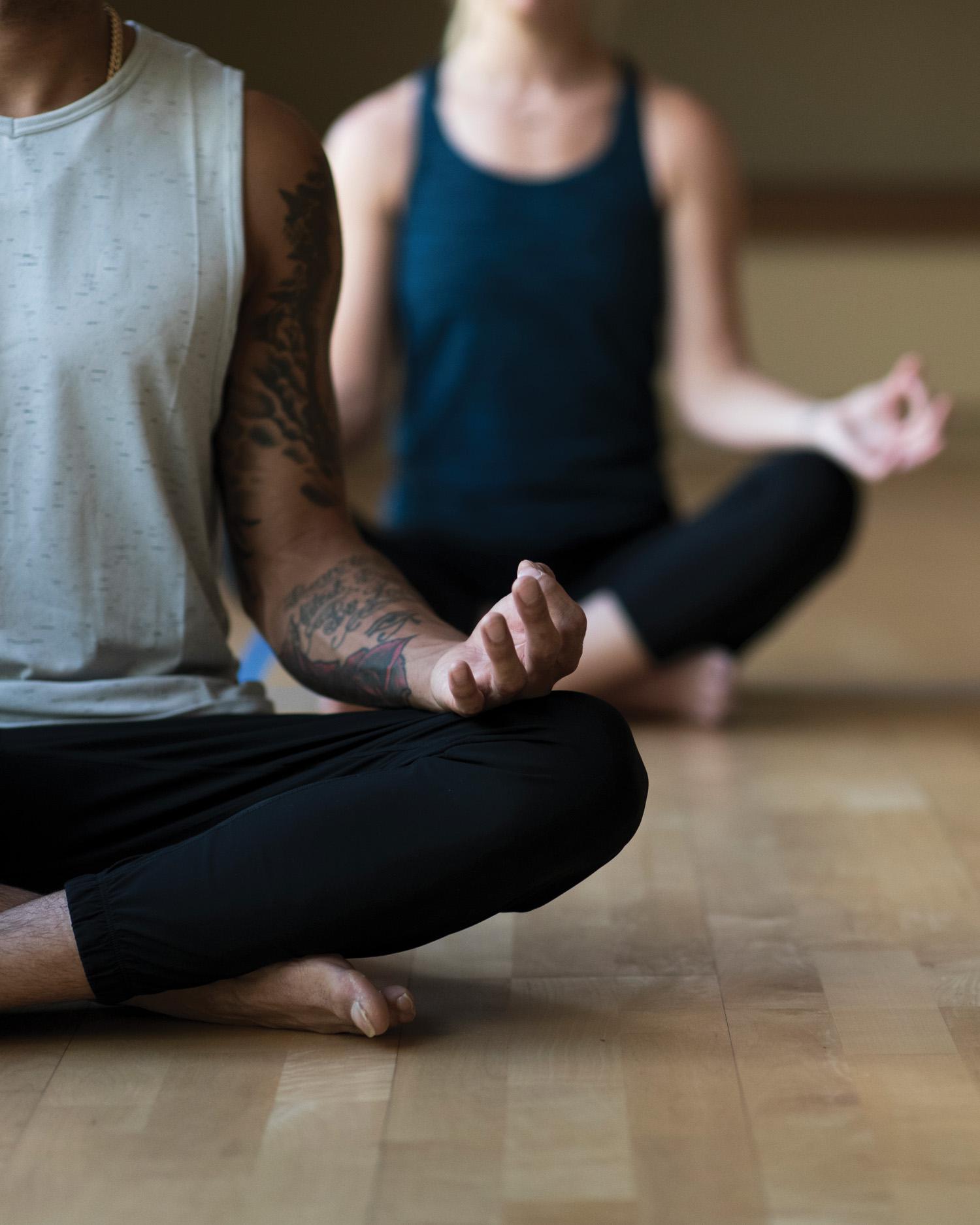 Close-up image of group meditation.