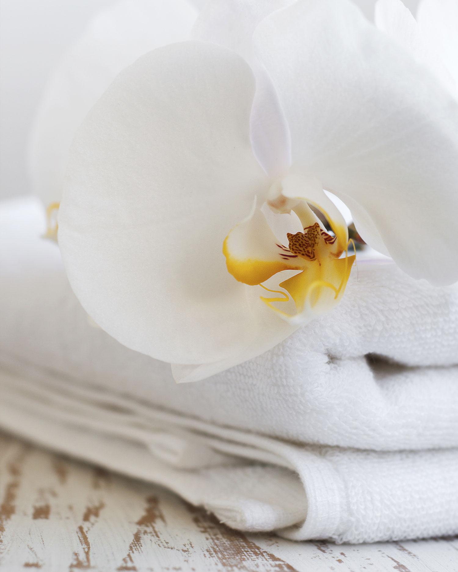 Photo of towels and flower