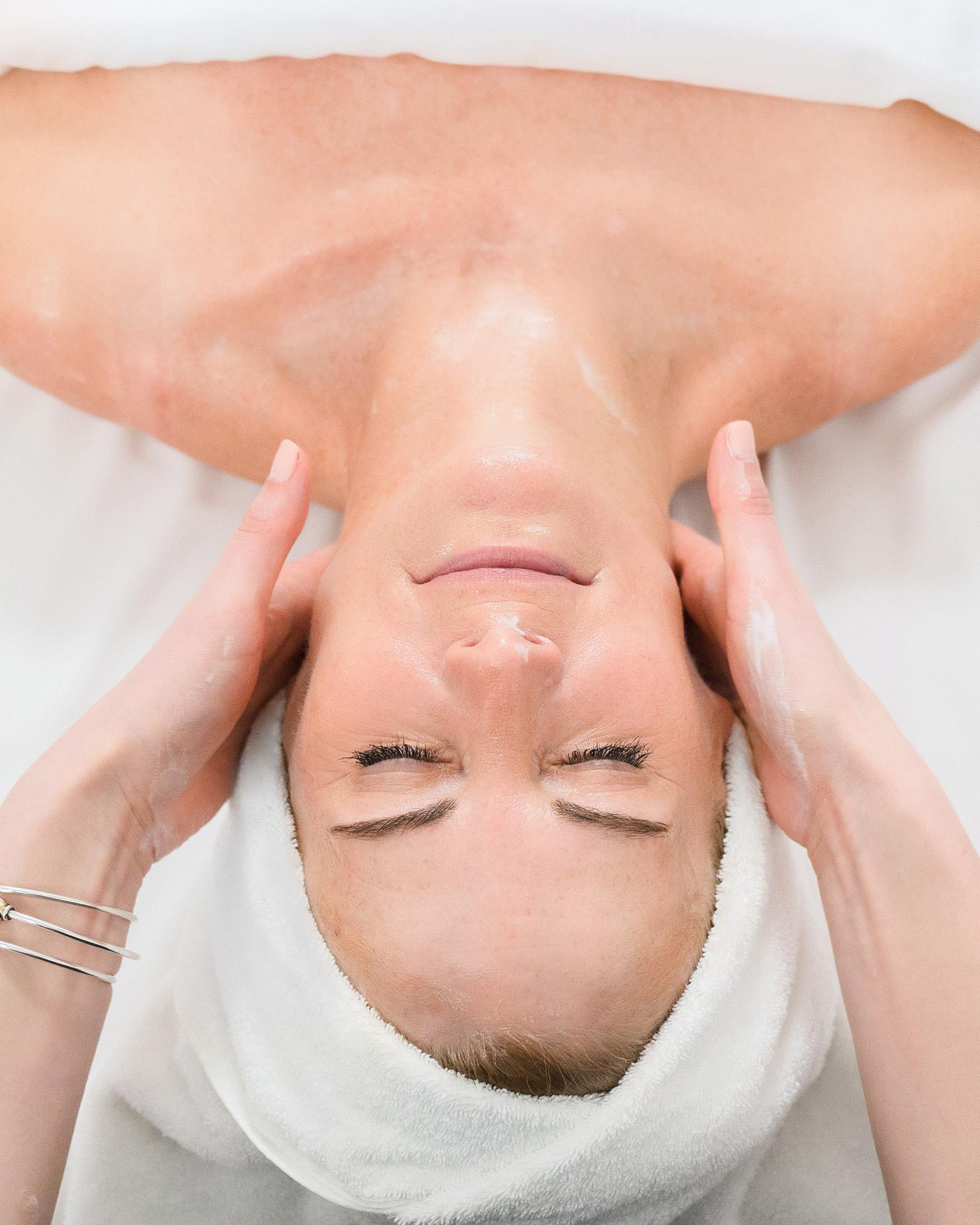 Overhead view image of woman getting a facial.