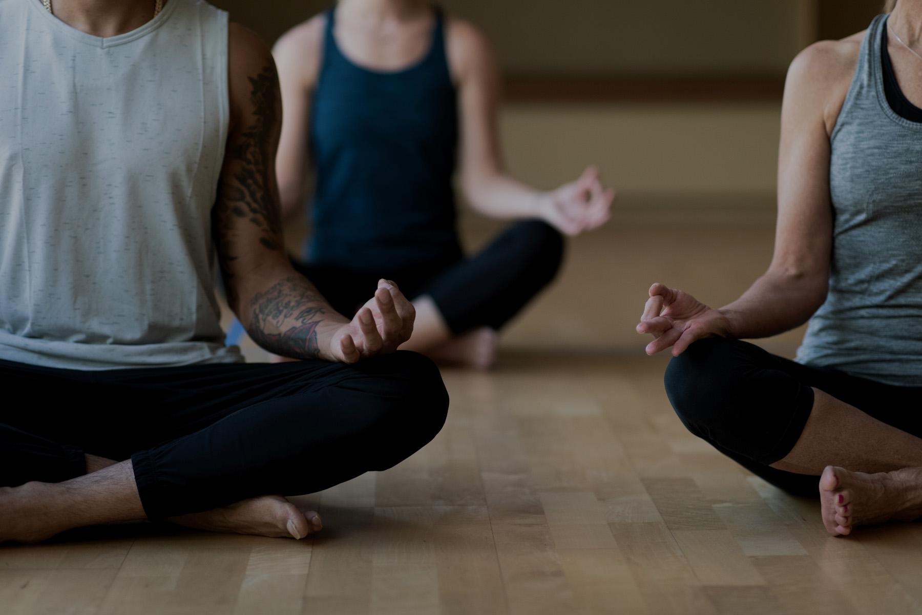 Close-up image of a group yoga class at Canyon Ranch Lenox.