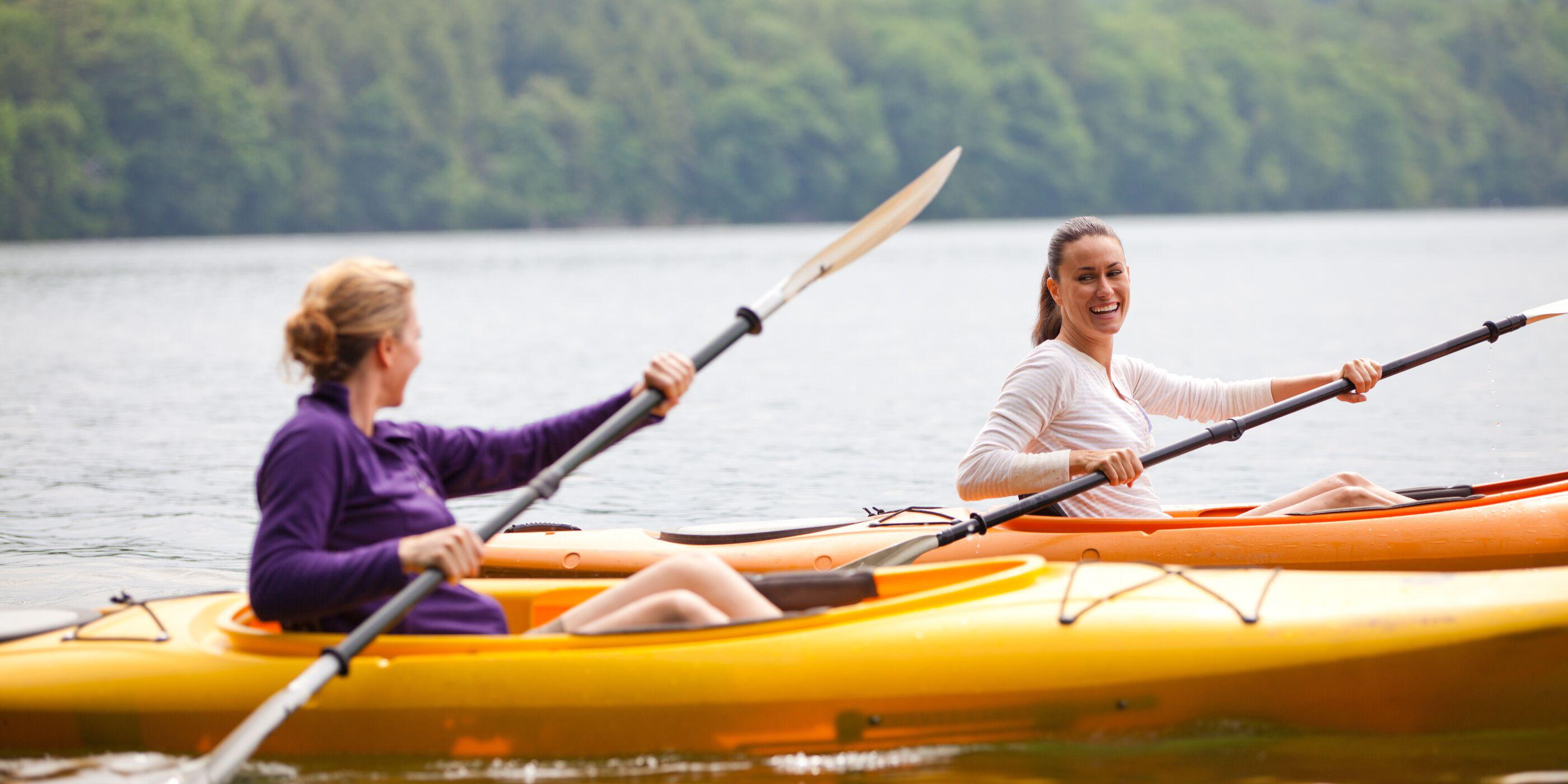 Close-up image of a couple kayaking at Canyon Ranch Lenox Health Spa Resort