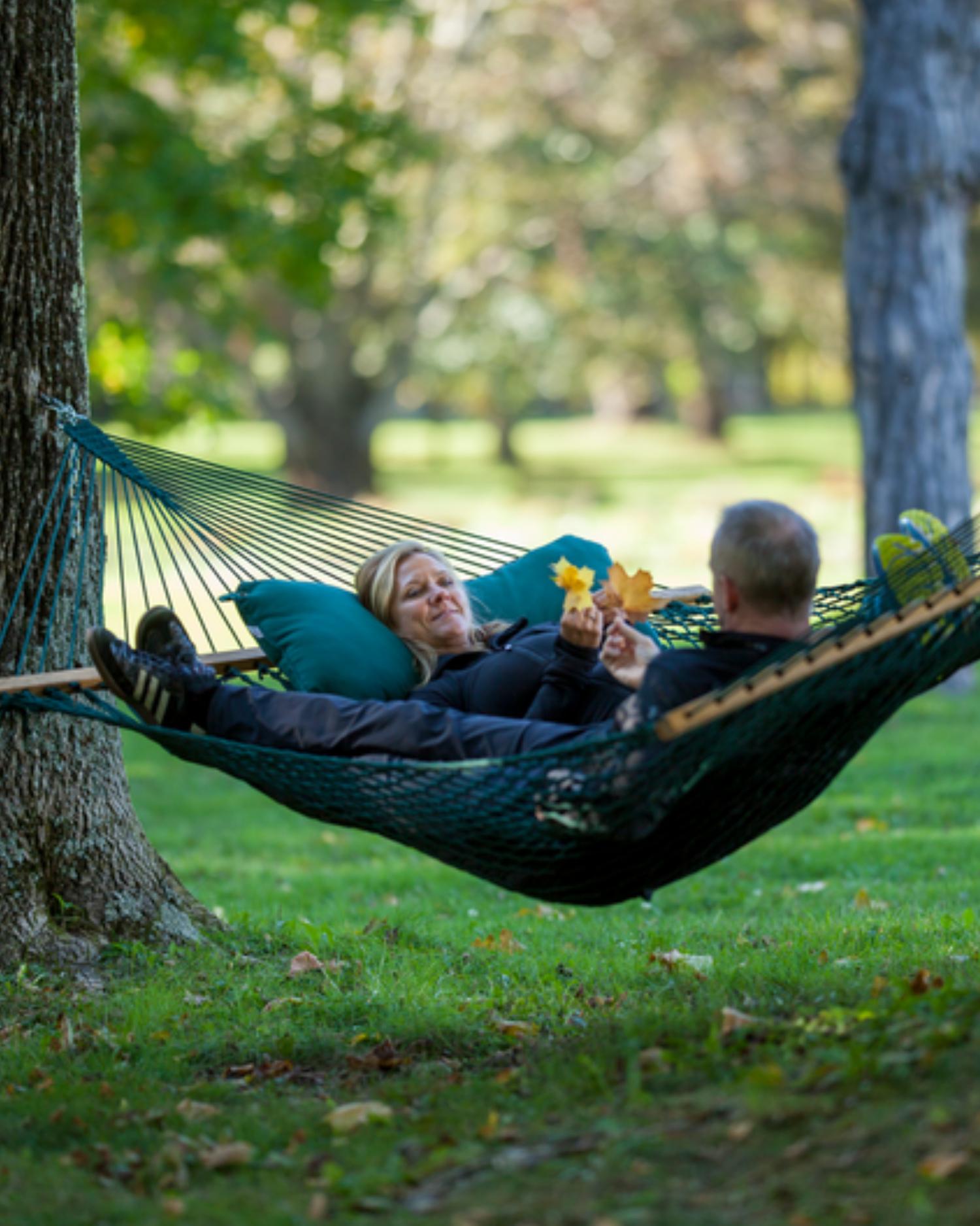 A man and woman in a hammock at Canyon Ranch Lenox
