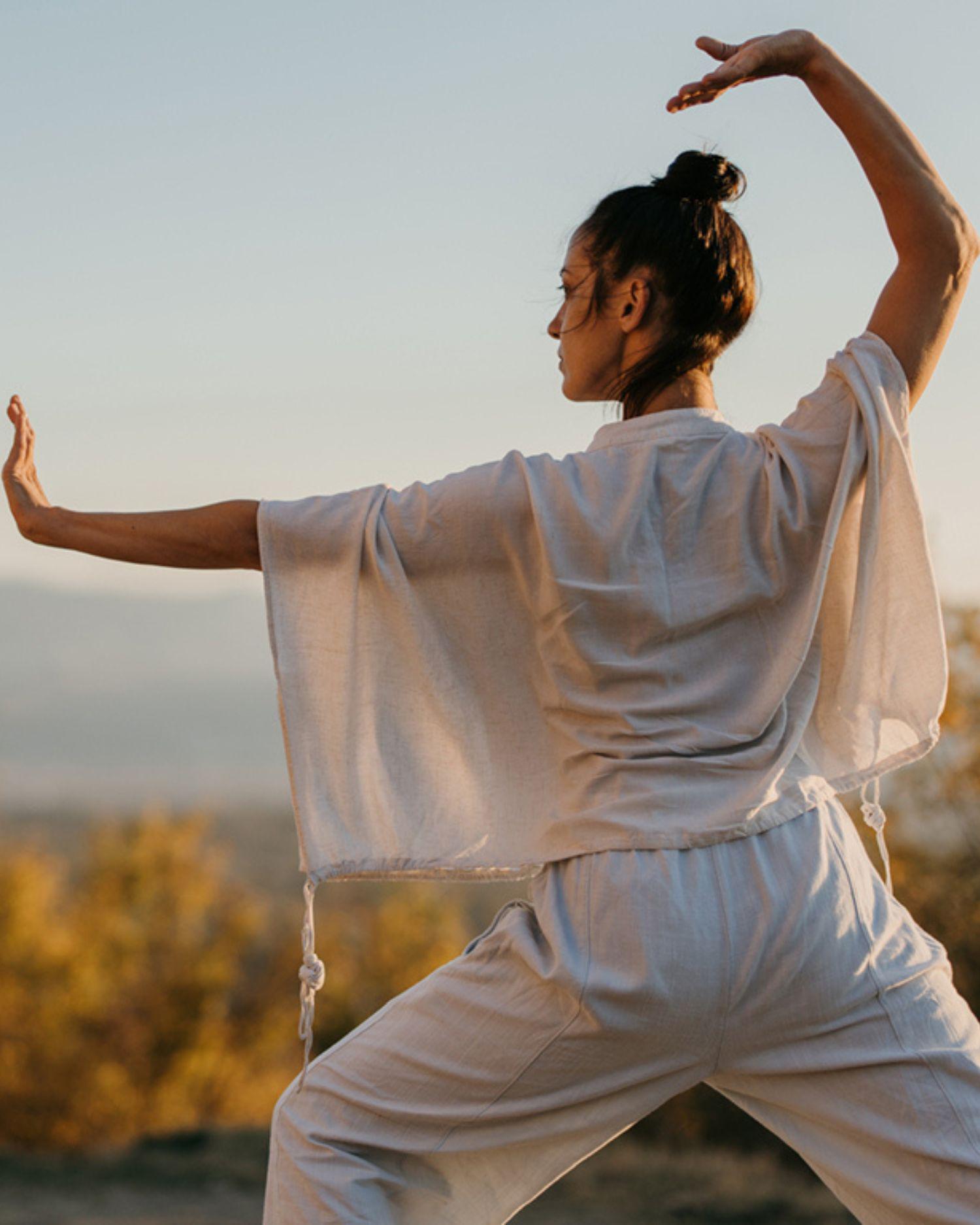 A woman doing Qi Gong  at the Berkshires at Canyon Ranch Lenox Fitness + Spa Resort