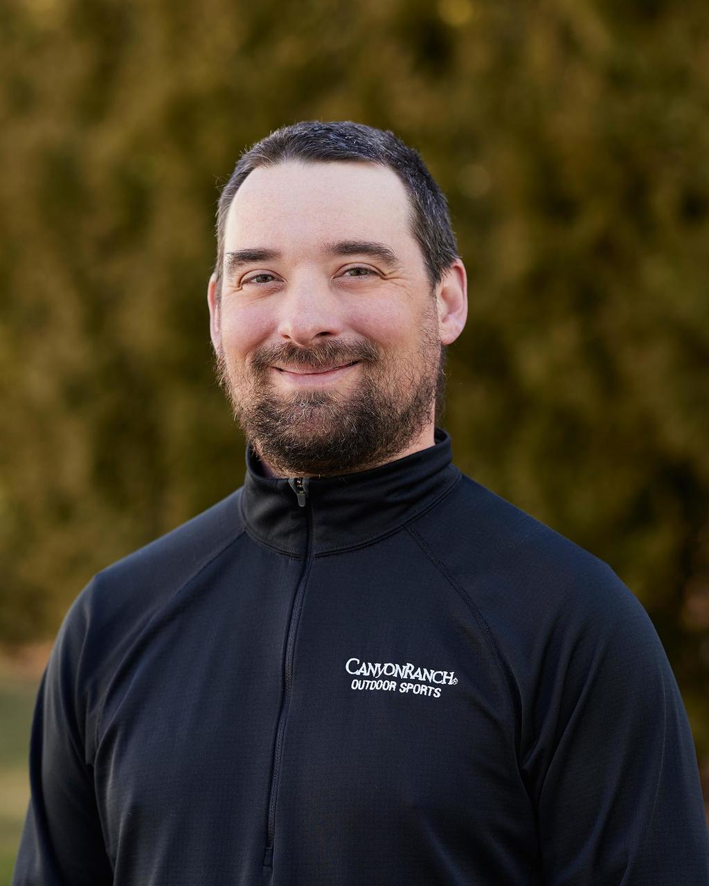 a headshot of Dan Brinton