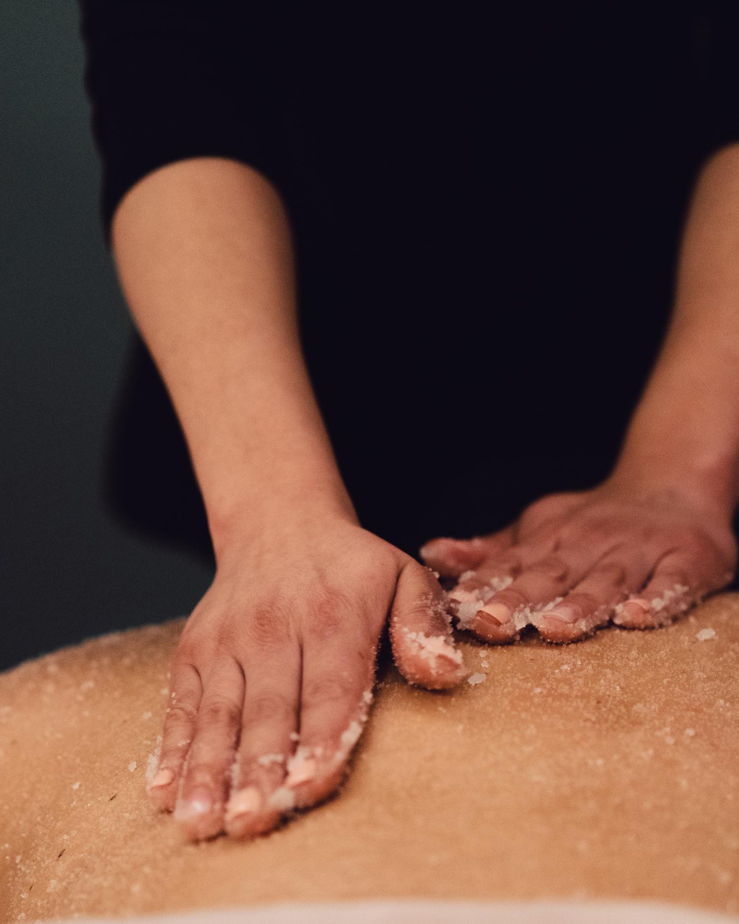 Guest receiving deep tissue massage