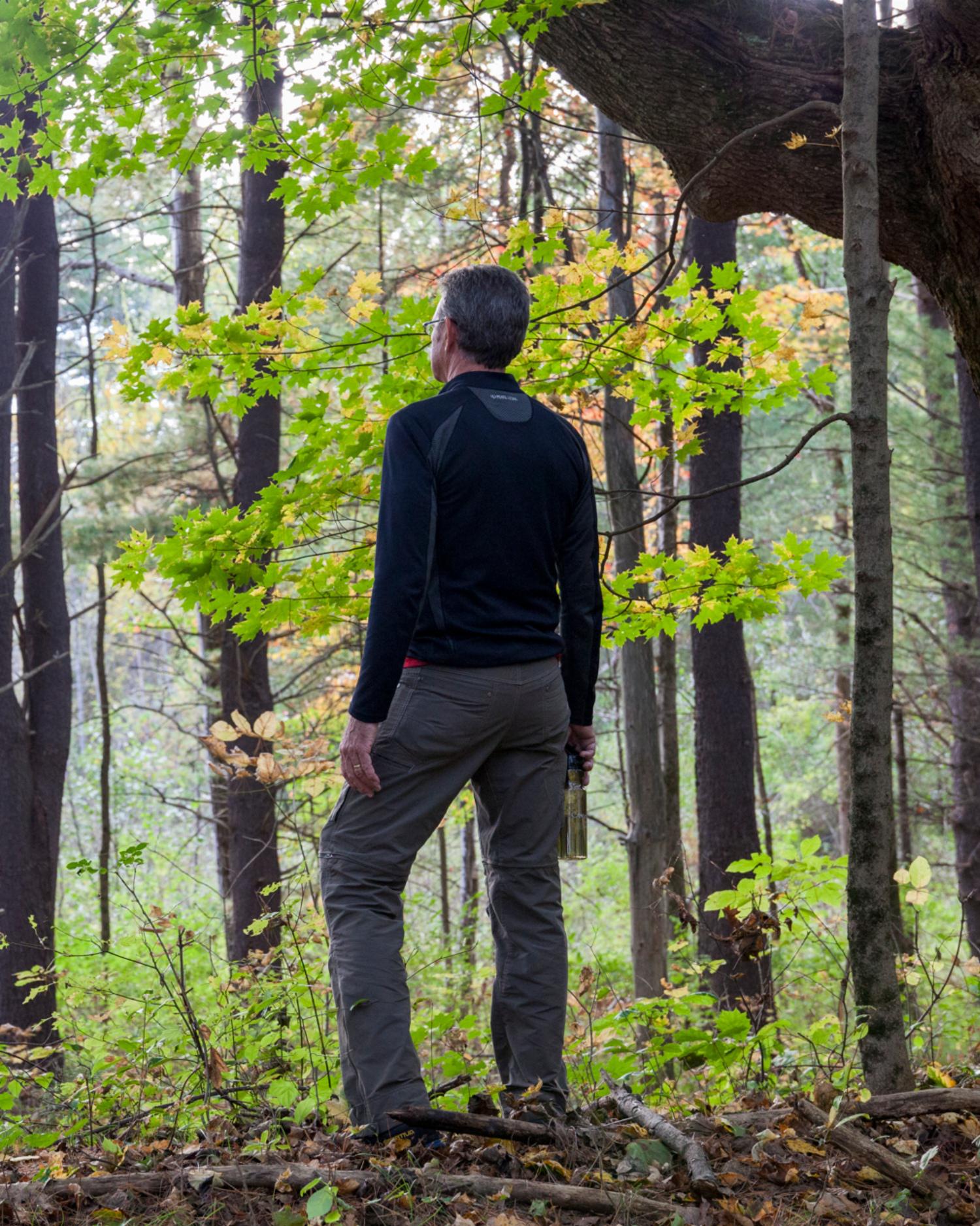 A man hiking in the forest