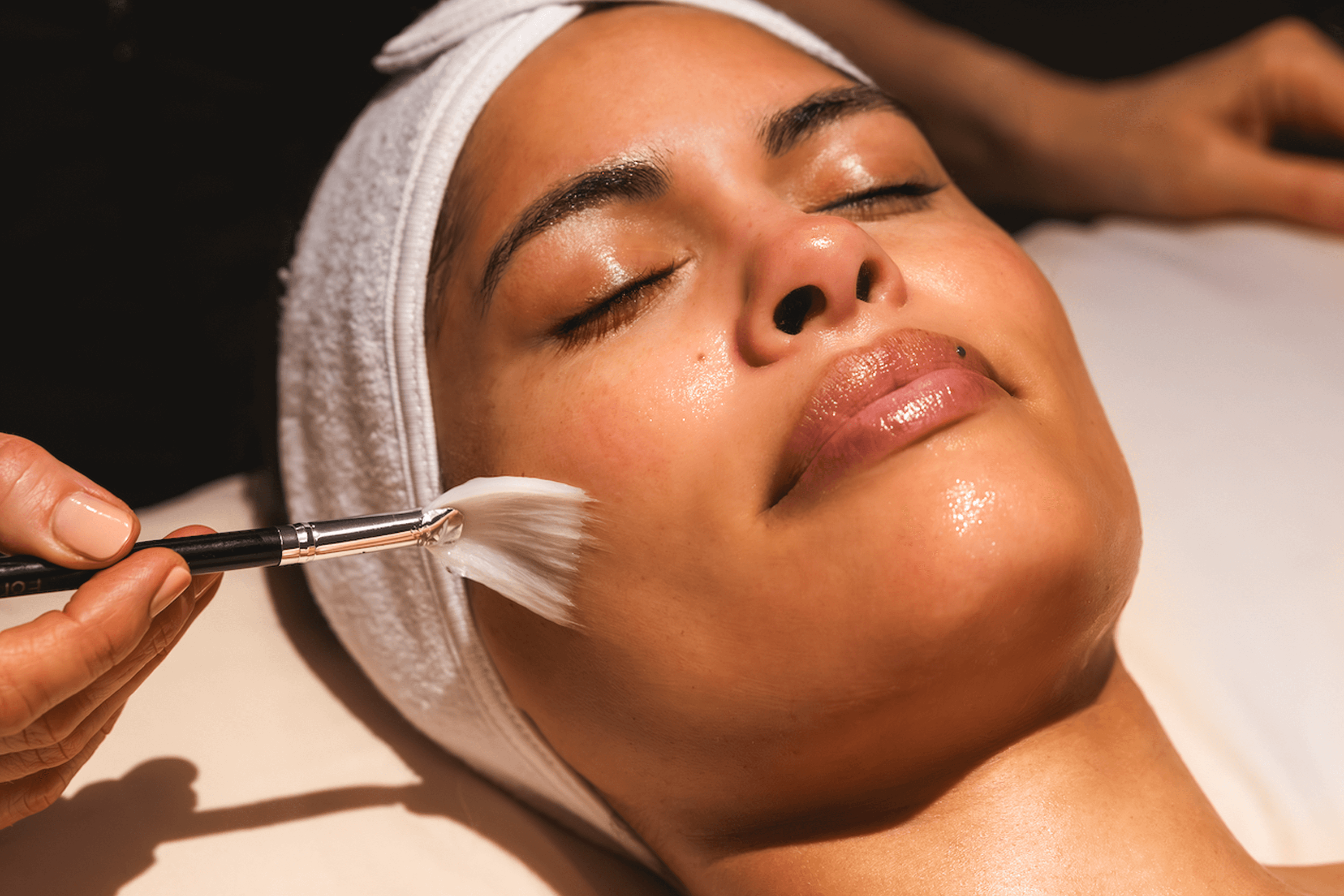 a woman getting a facial