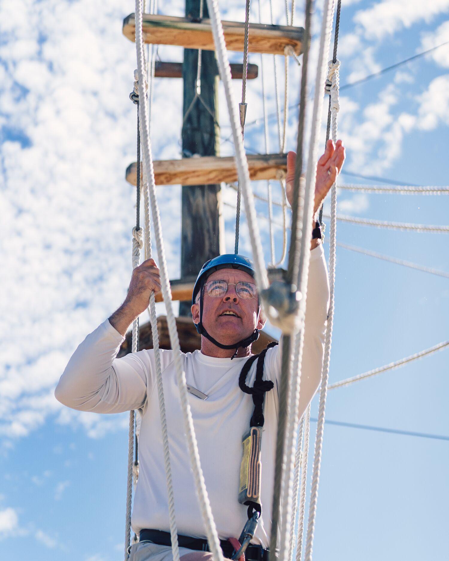 xxl_Web_Page_Hero_Vertical-close-up-man-ropes-course-canyon-ranch