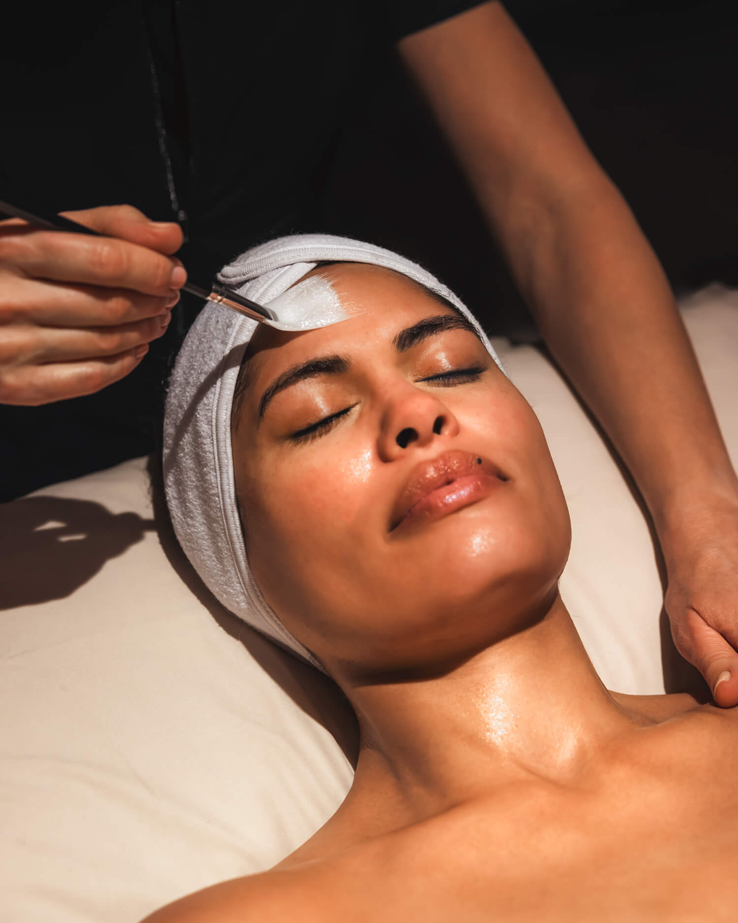 A woman getting a steam facial