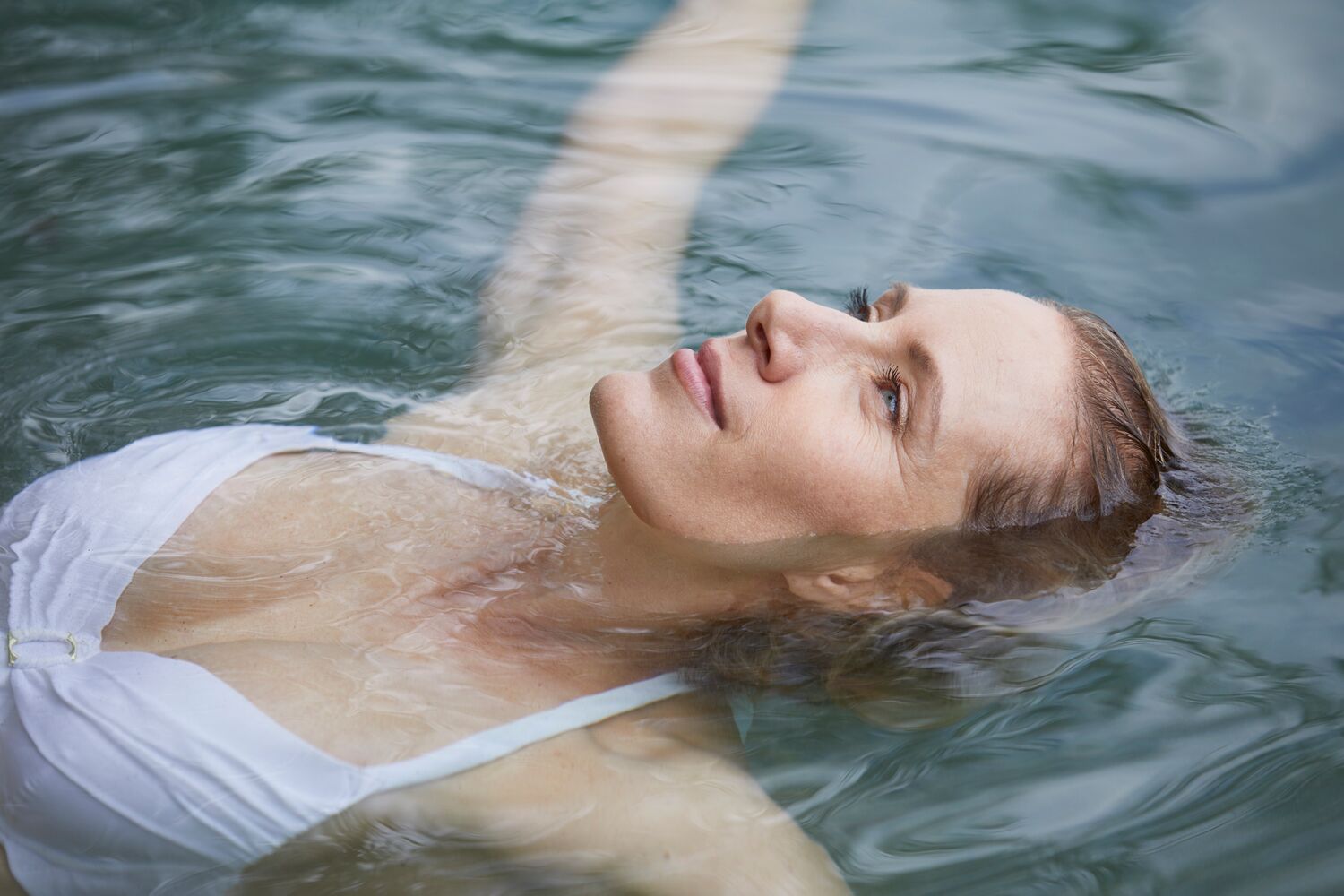 A woman floating on the water