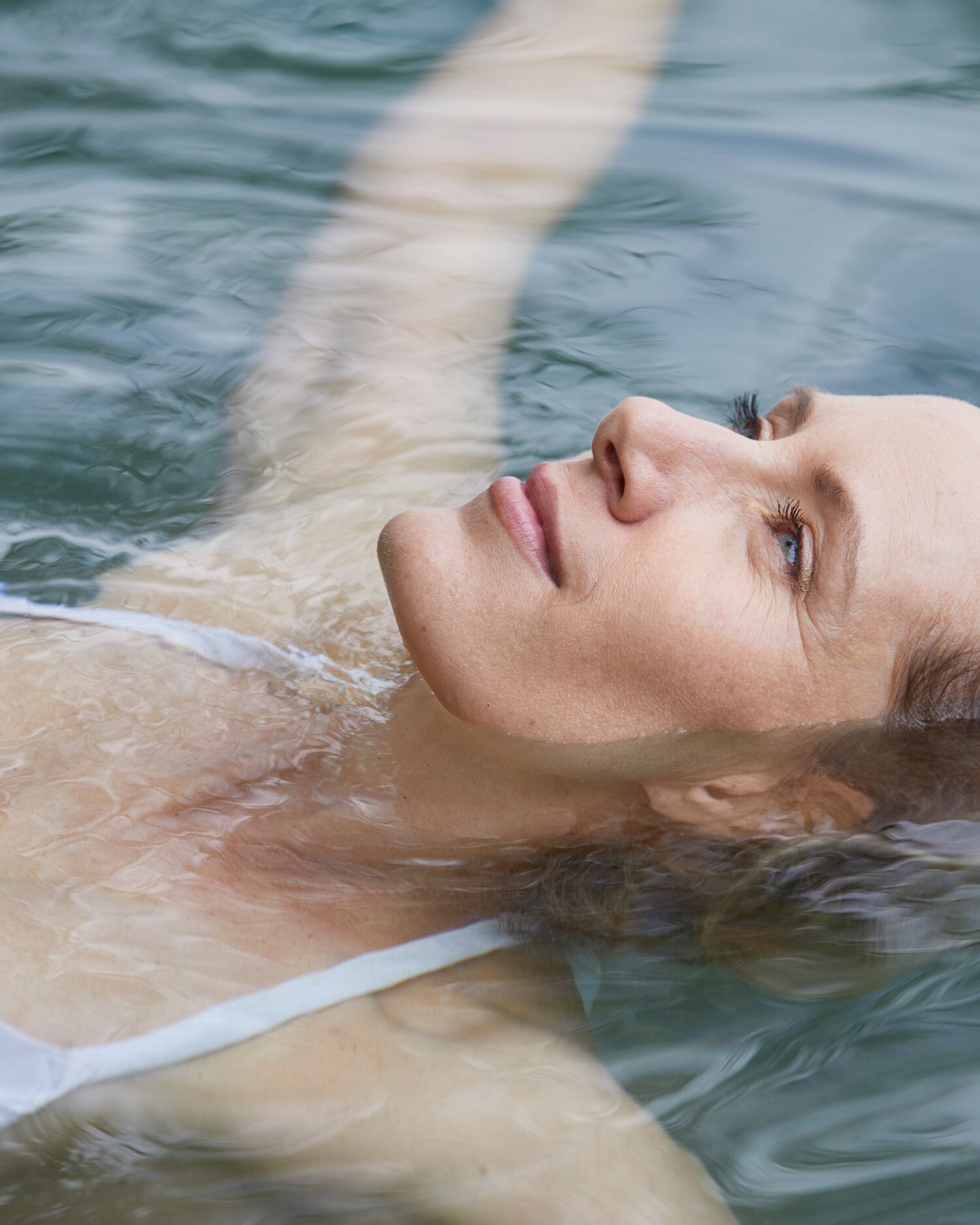 A woman floating on the water