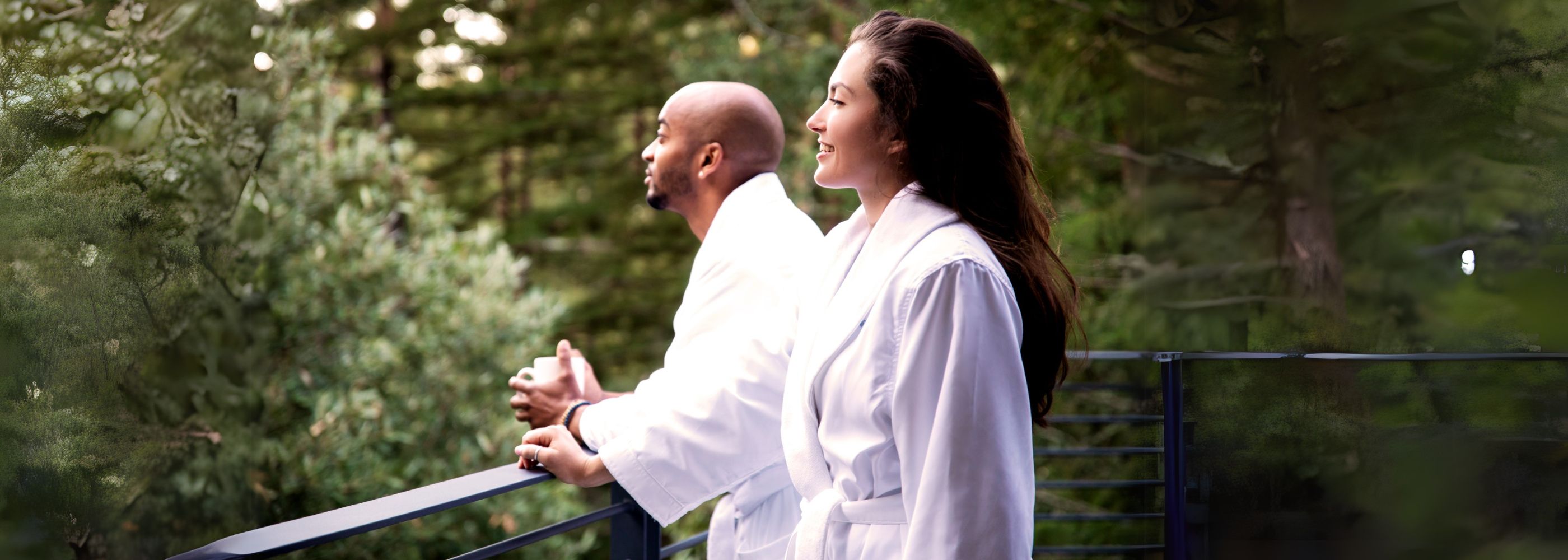 A couple in robes in the forest