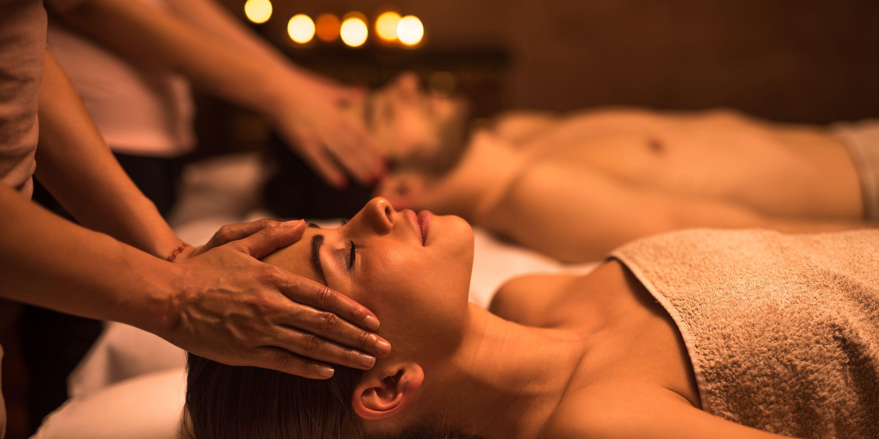 Two people getting a couples massage